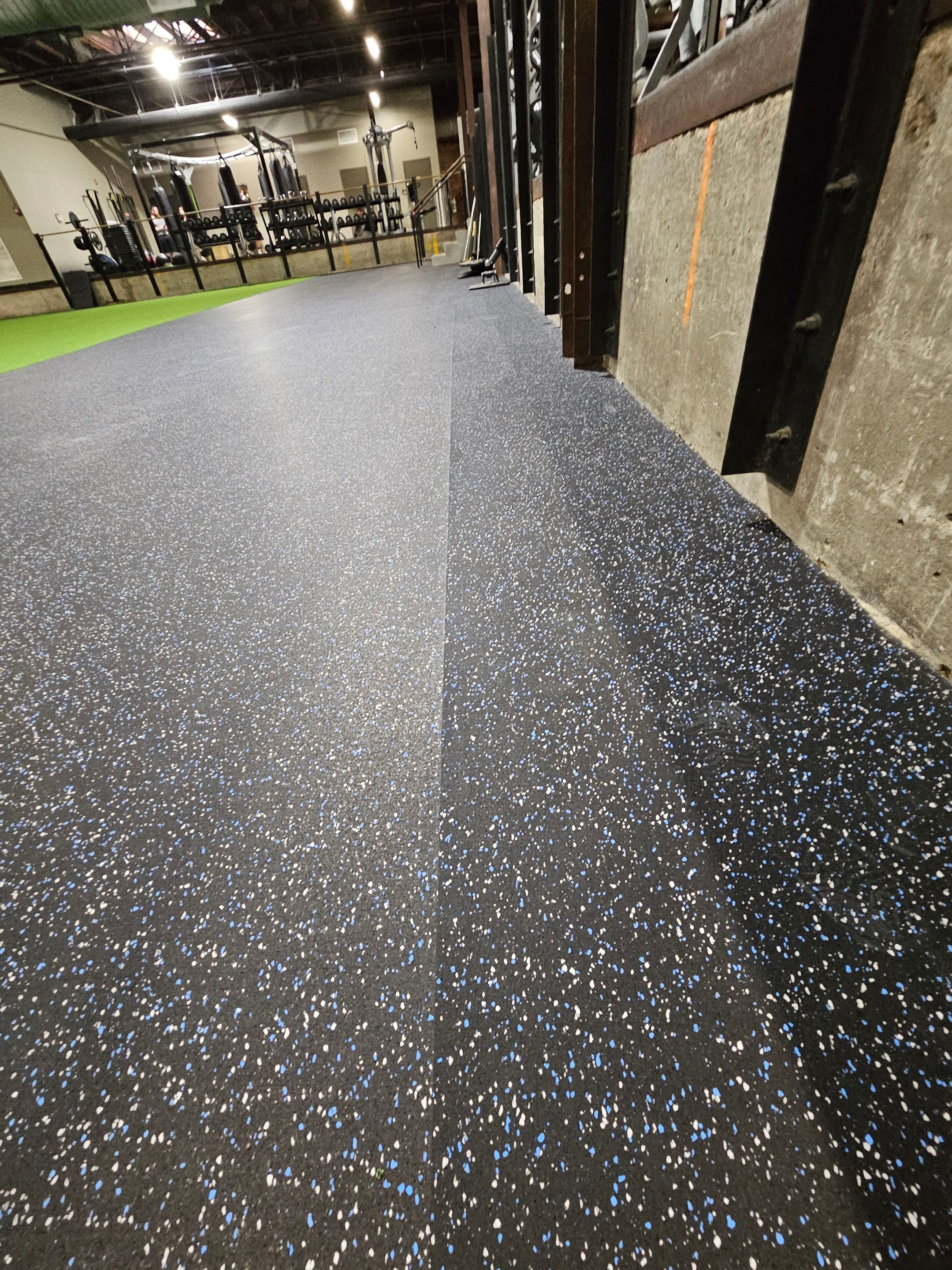 Norfolk OLF - Strength area turf, rubber installation and front desk by Nova HomeWorks 