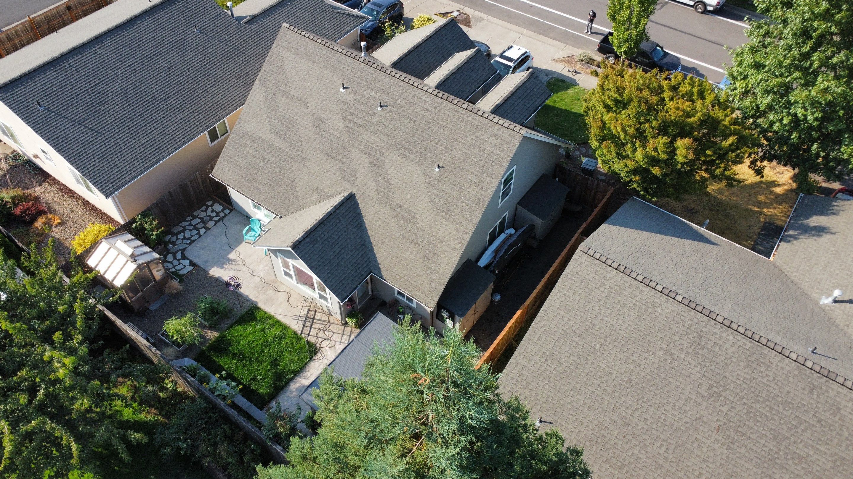 Granite Black Residential Roof Replacement by Orezona Building & Roofing Company, Inc.