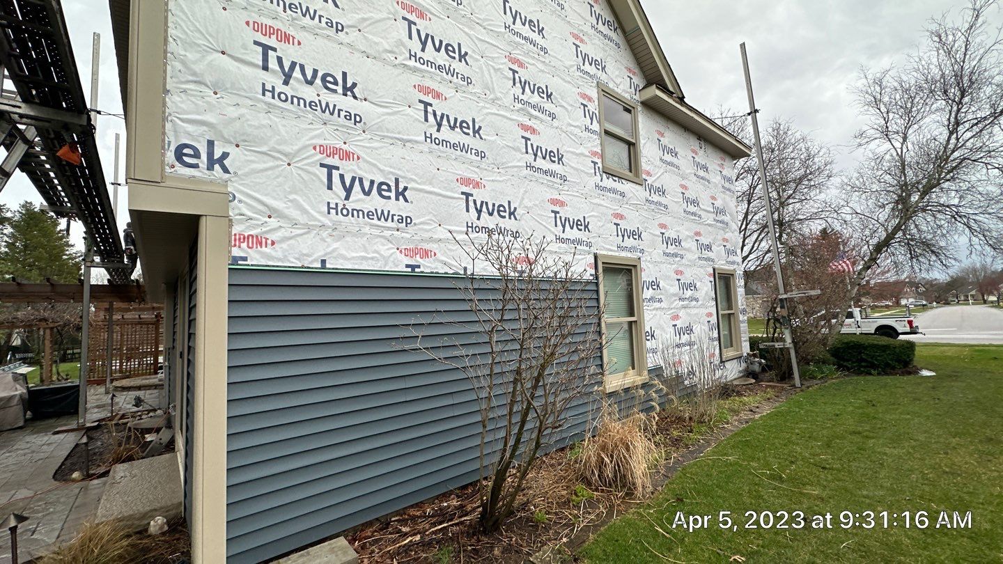 Siding Installation using Alside Charter Oak by Pro Home Services Inc