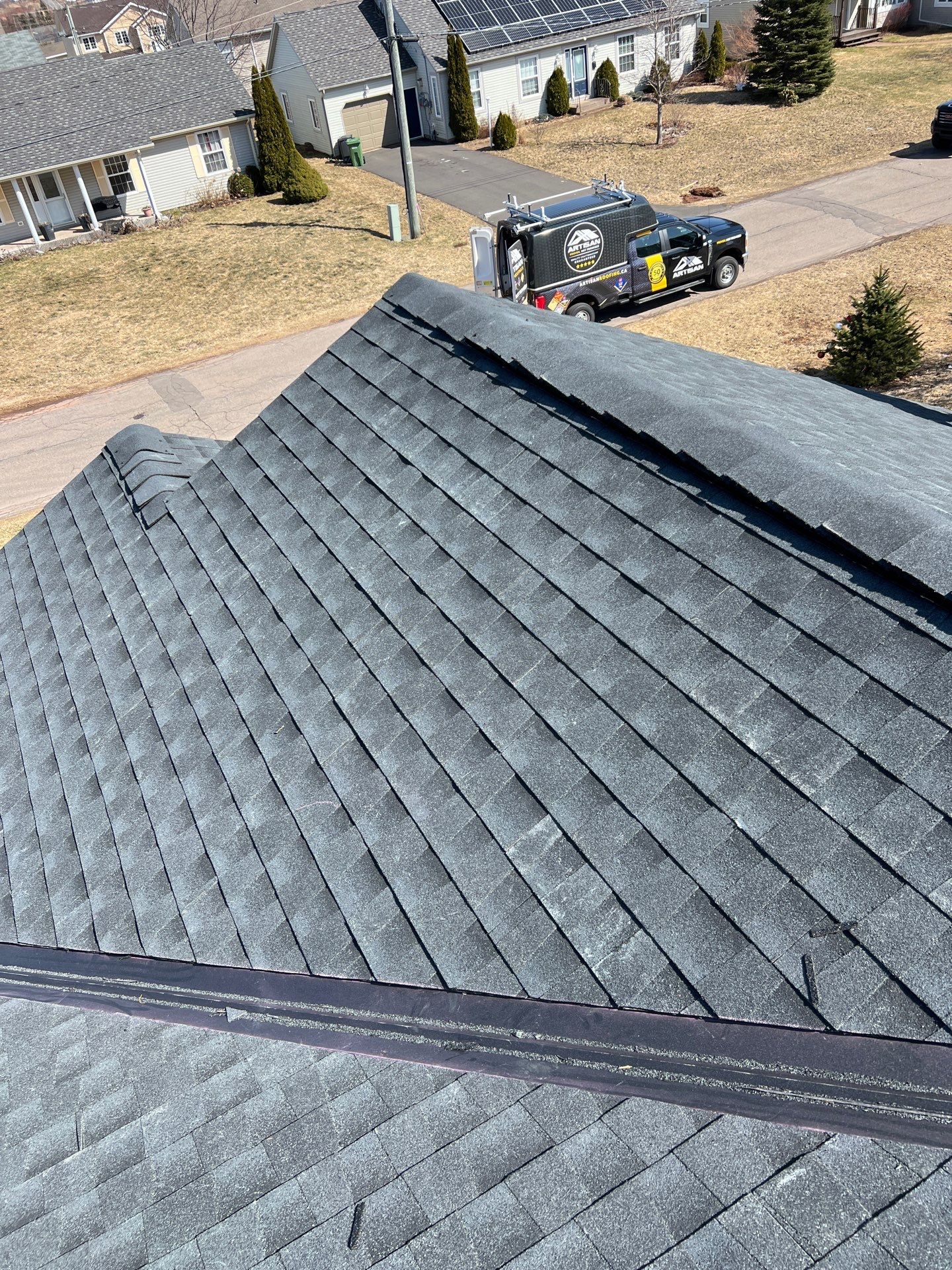 Residential Roofing Installation using Asphalt GAF HDZ in Charcoal by Artisan Roofing & Home Improvements Inc.