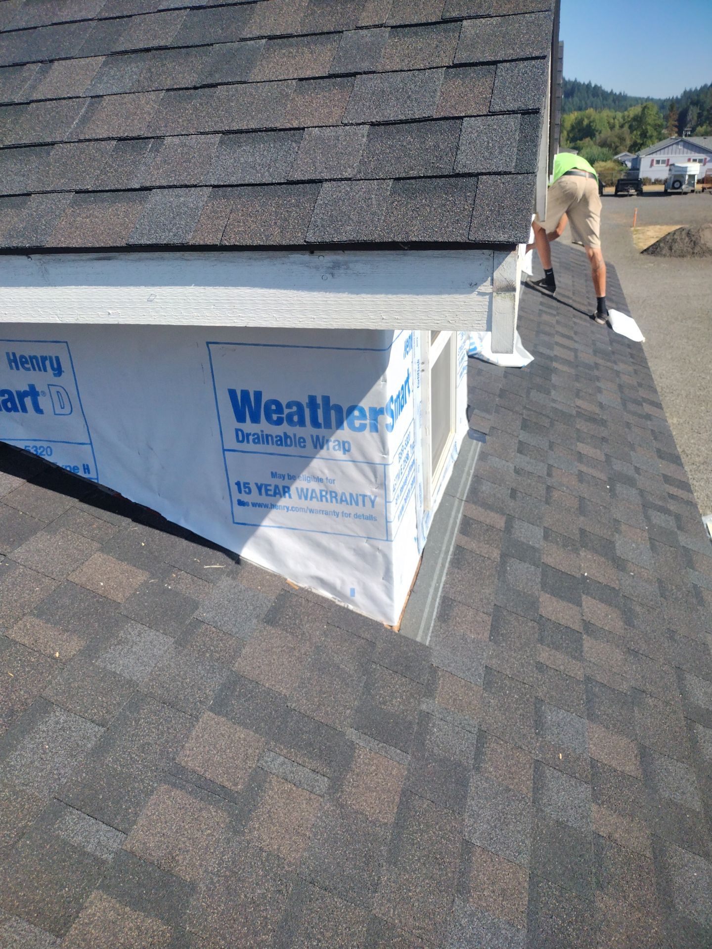 Residential Roof Replacement with Metal Accents by Orezona Building & Roofing Company, Inc.