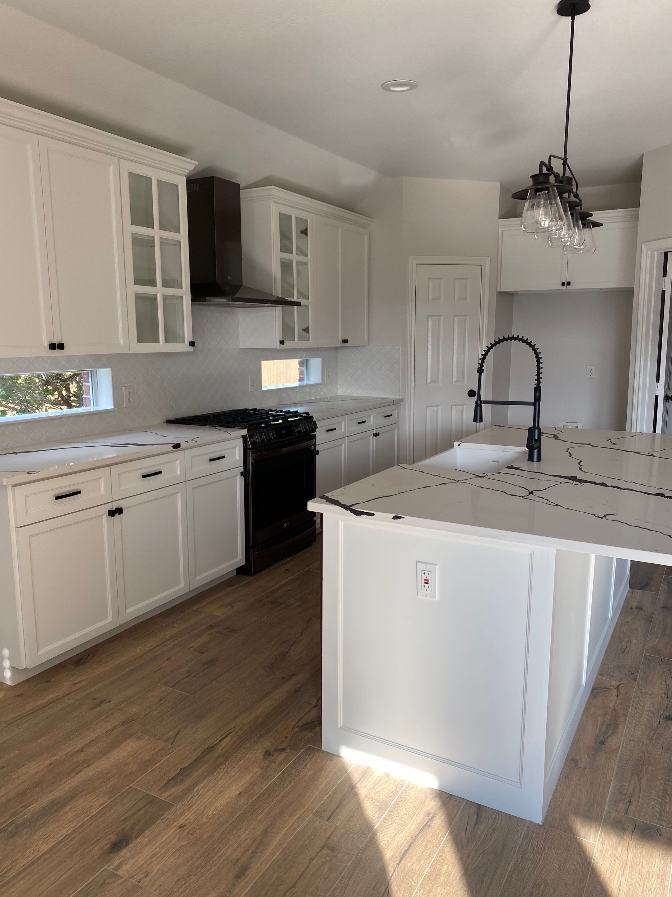 Custom cabinetry Kitchen Remodel by SLM General Contractors & Roofing