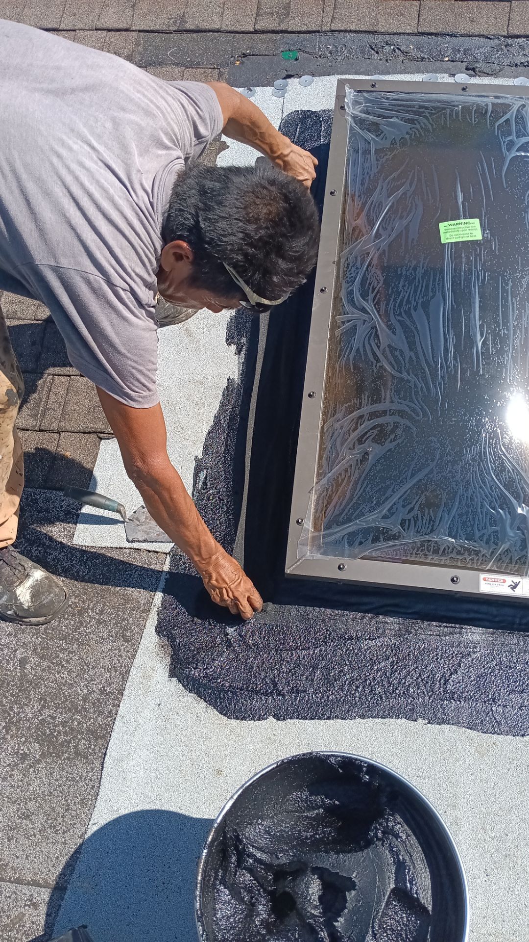 REPLACE NON APPROVED SKYLIGHT ALONG WITH CLOGED GUTTER by Morton Roofing, Inc.