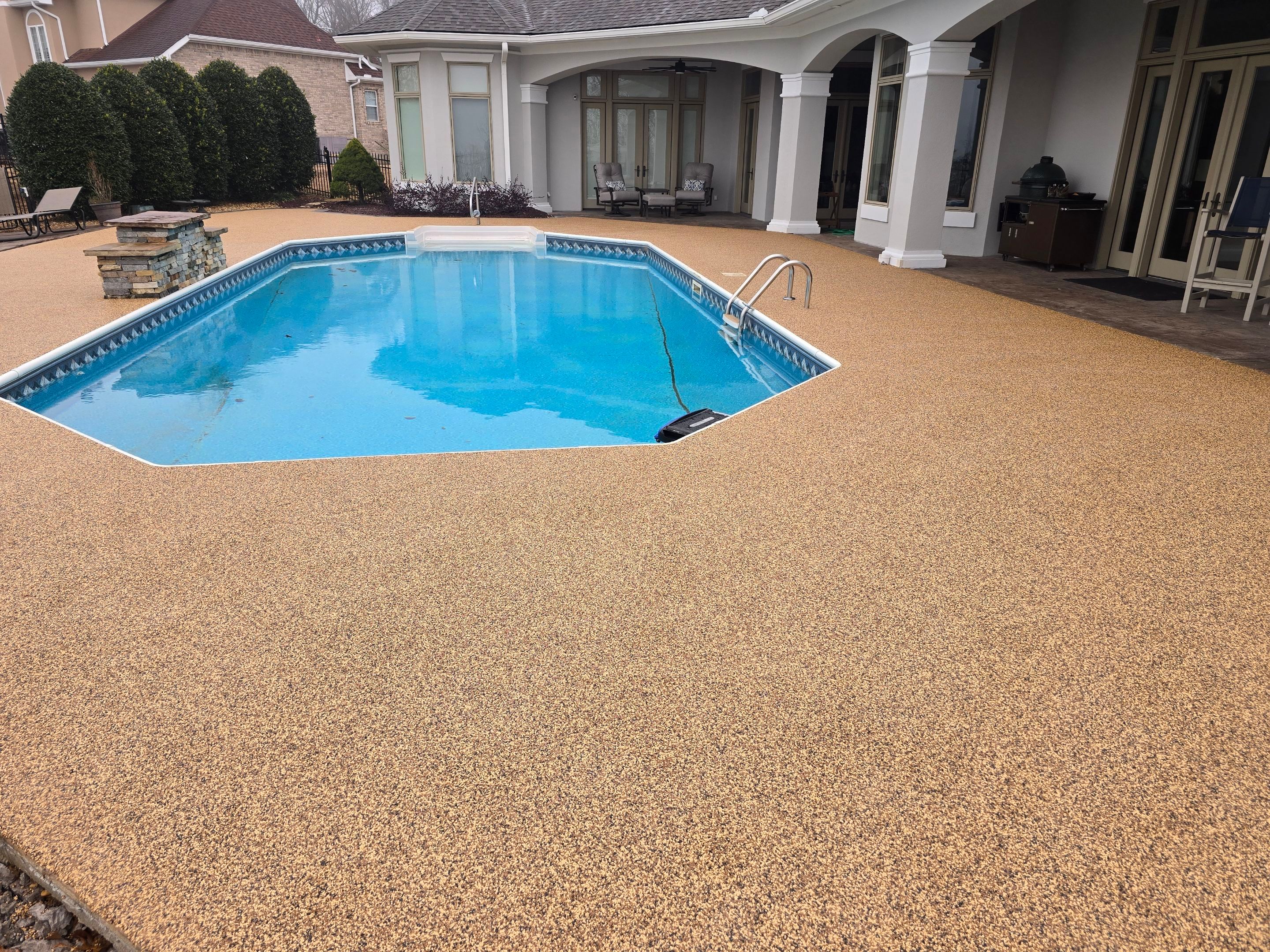 Pool Deck Using Brownstone by Elite Floor Solutions