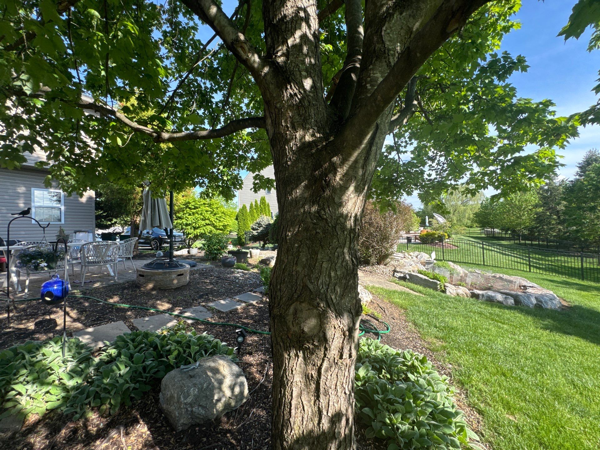 Backyard Retreat: Techo-Bloc Patio + Firepit Lounge by Saylor’s Lawn & Landscape