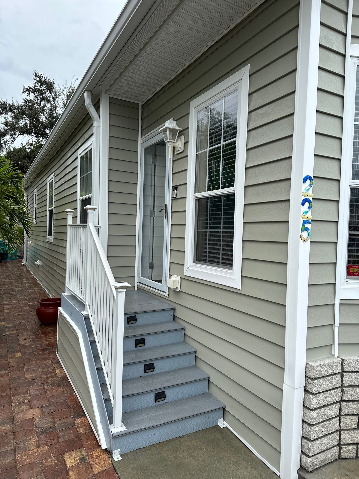 Gutter Cleaning and House Washing Services  by Sunshine AquaWash