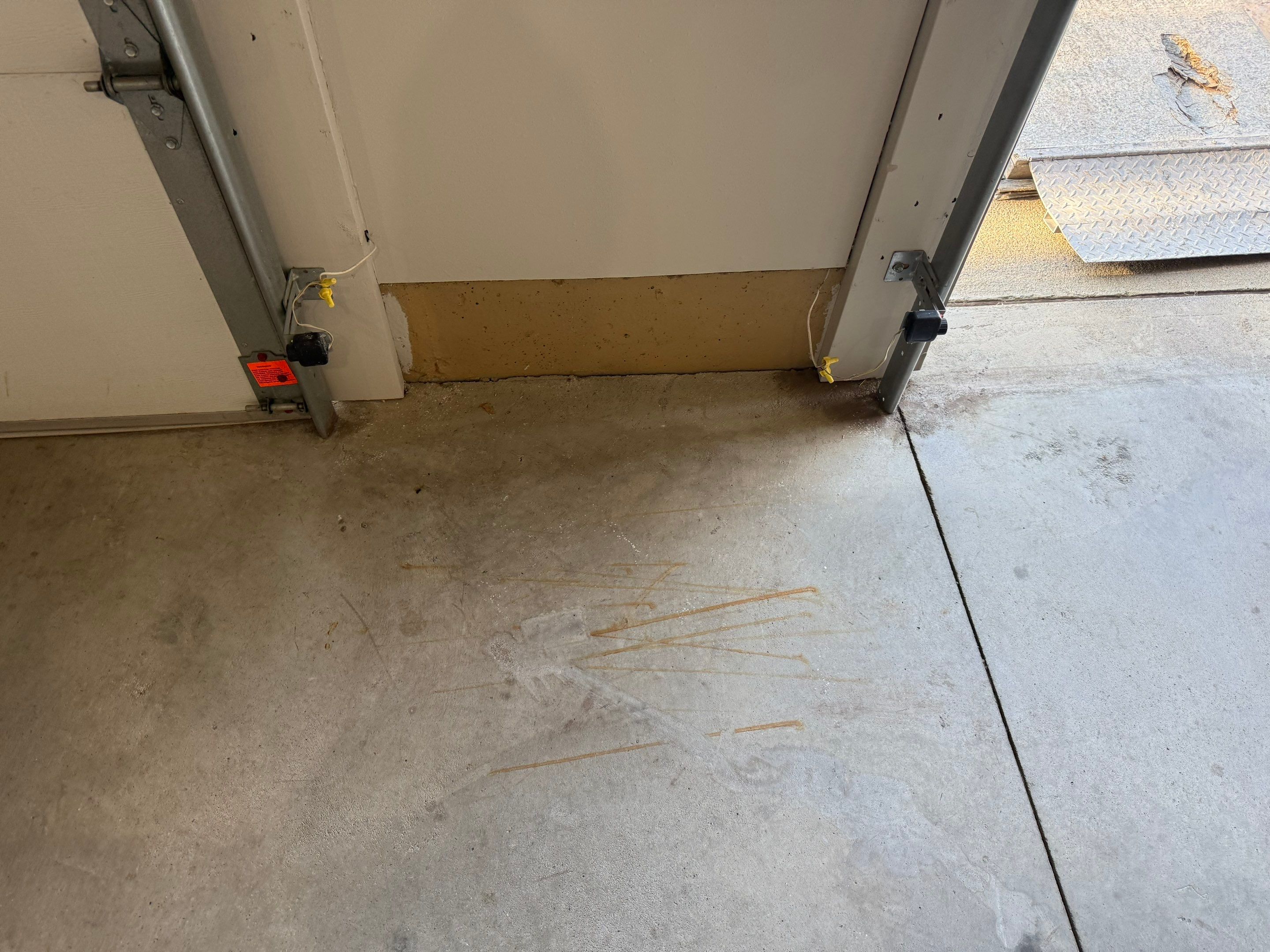 Multi-Car Garage Epoxy Floor Coating in Beresford by Select Painting, Coatings & Garage Cabinets