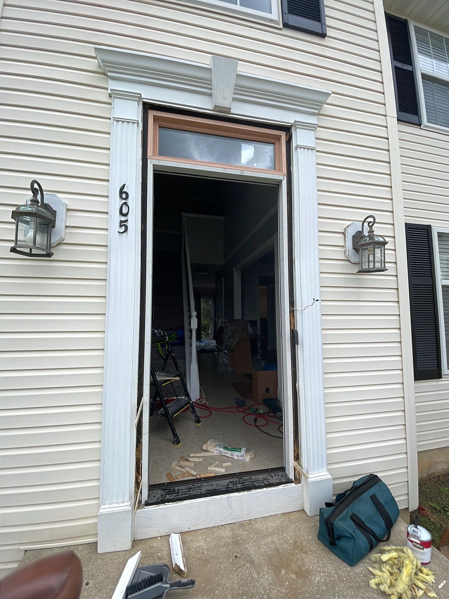 Exterior Installation using Transom Window & Door by A1 NERDY HOMES LLC