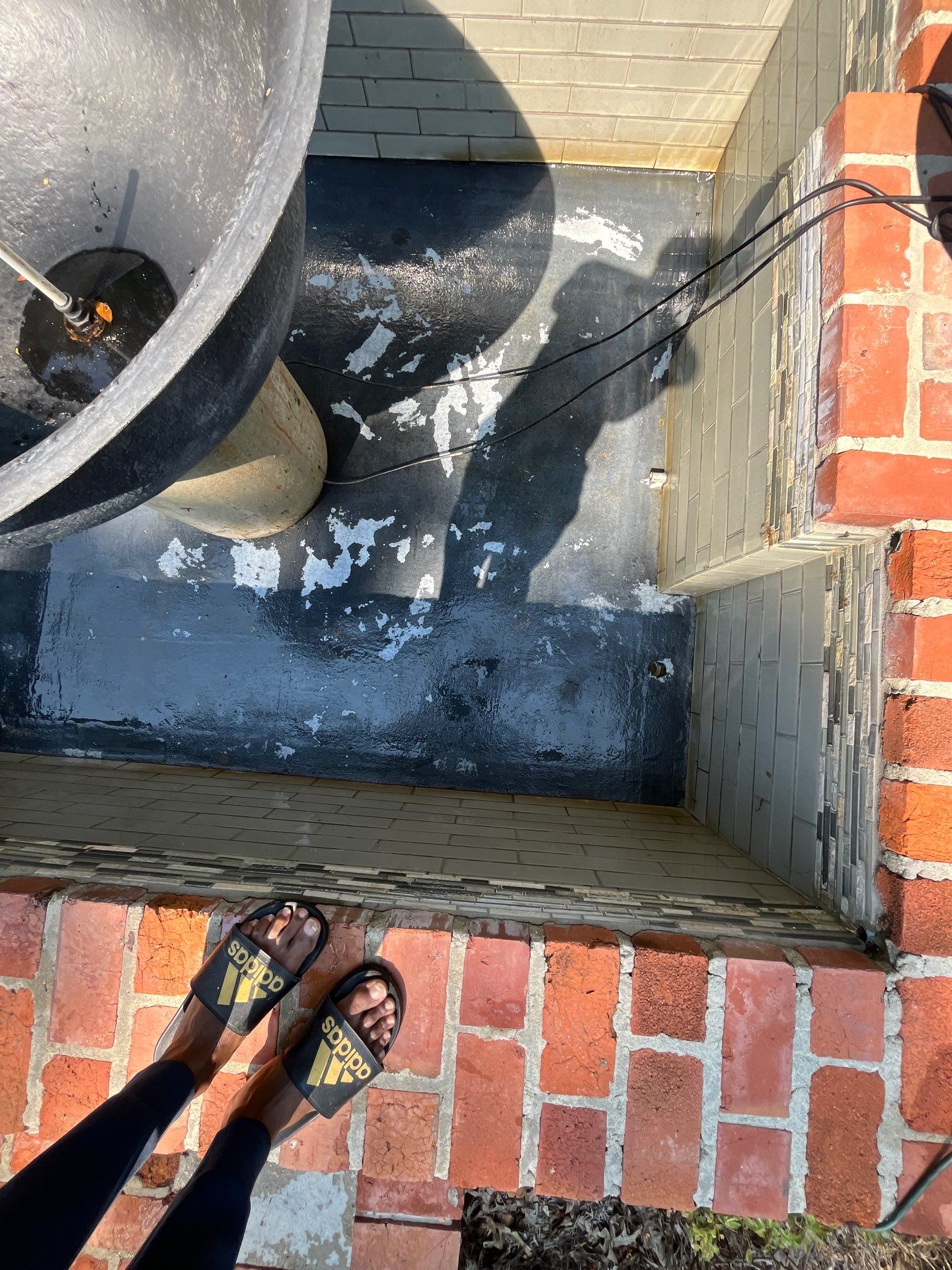 Pool Cleaning using Pool Cleaner by College Bros Outdoor services