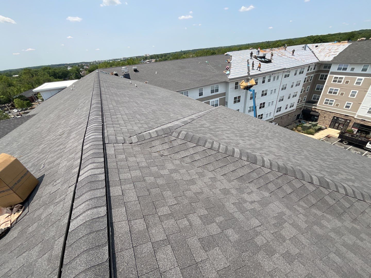 Multi-Family Commercial shingle roof by Alpha Design Services