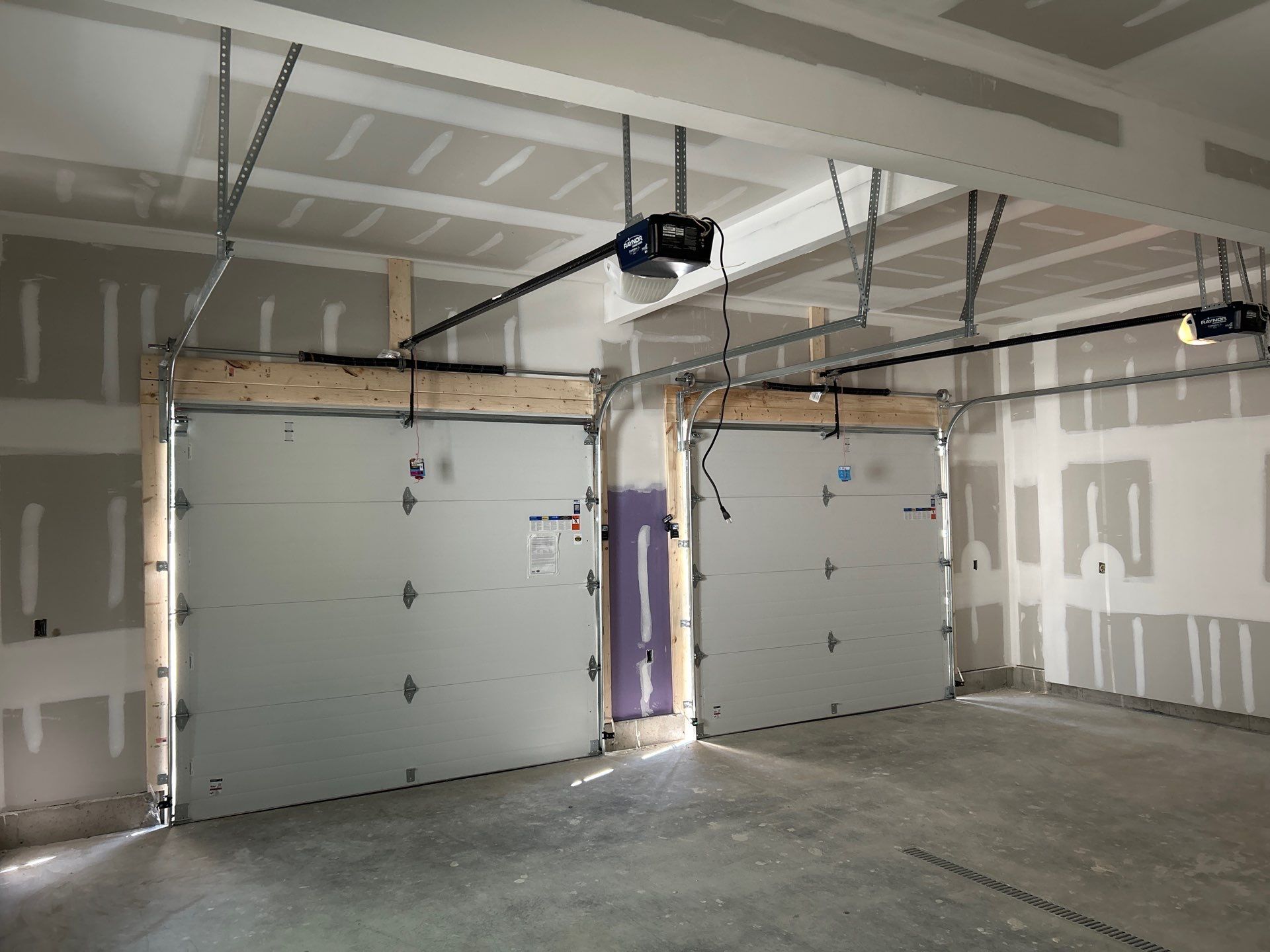 Installation of a Clopay Modern Steel Garage doors by Keene Door