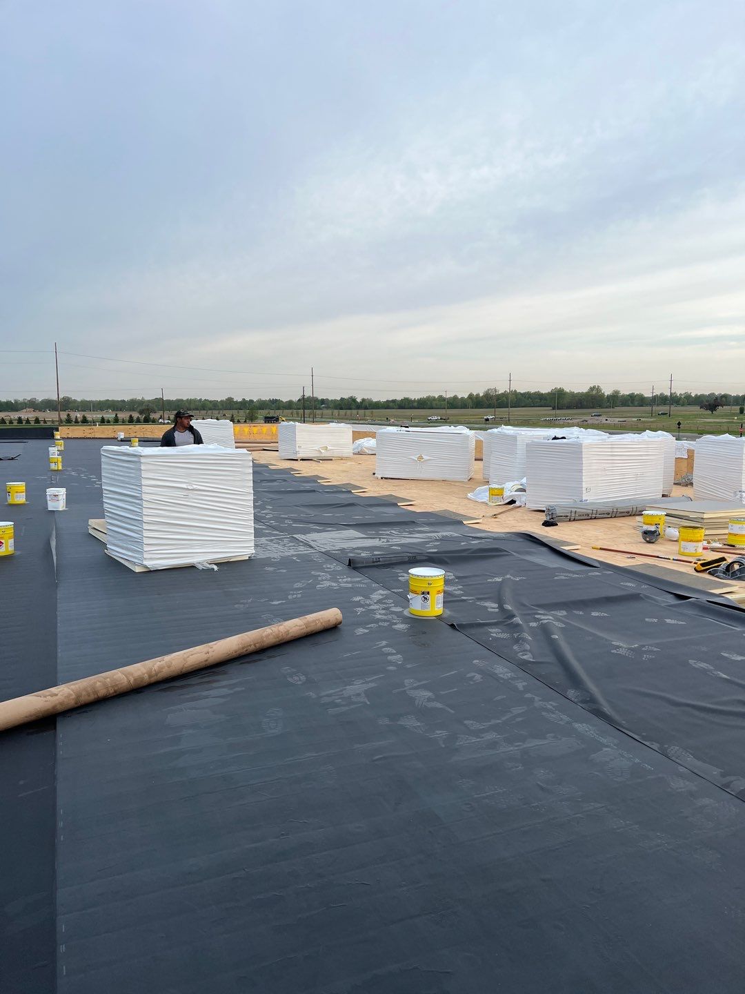 Commercial Roofing Installation using 60 mil rubber roof  by Nitro Roofing and Construction