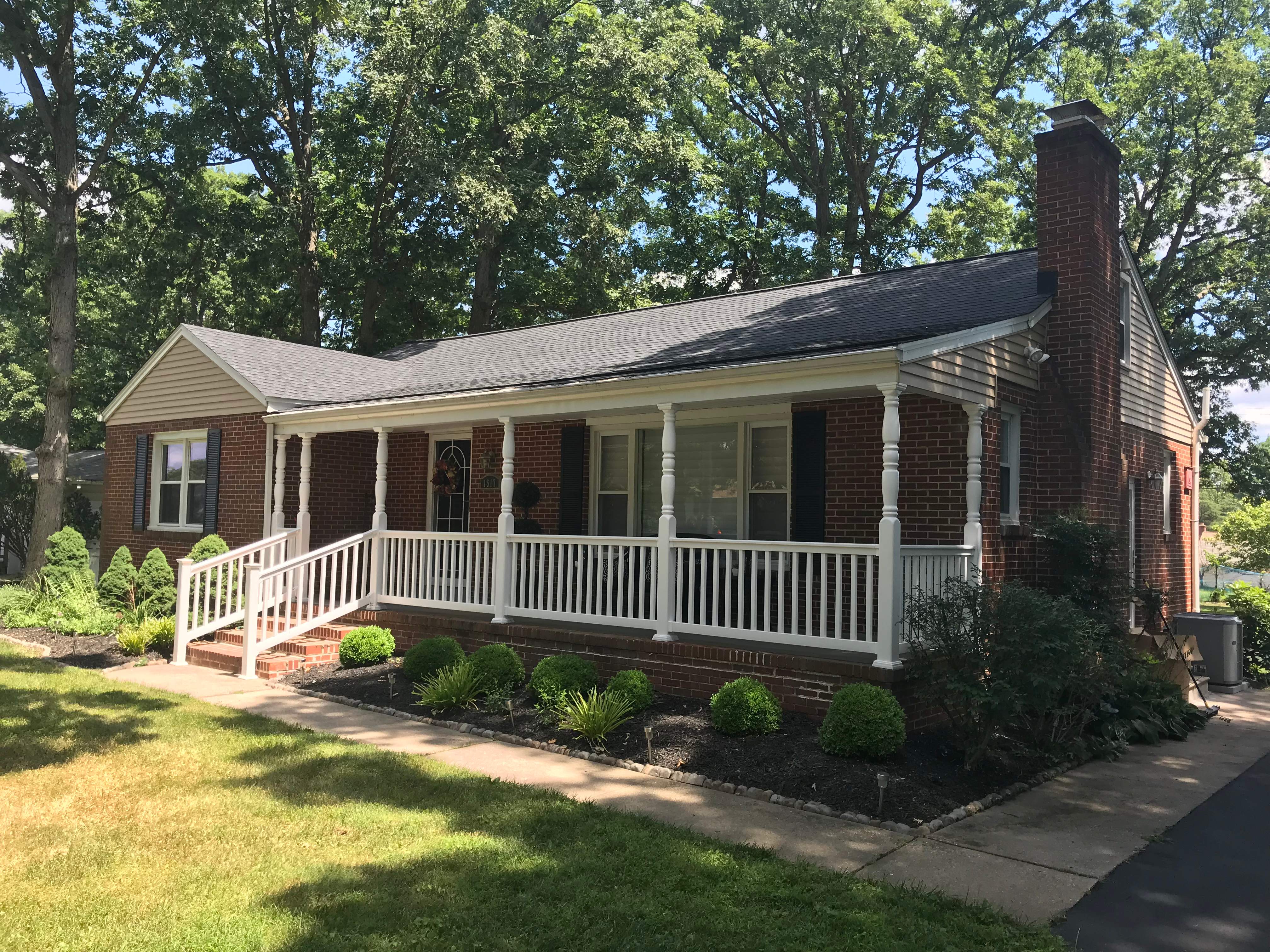 Residential Roofing Installation using Charcoal Black by Alpha Design Services