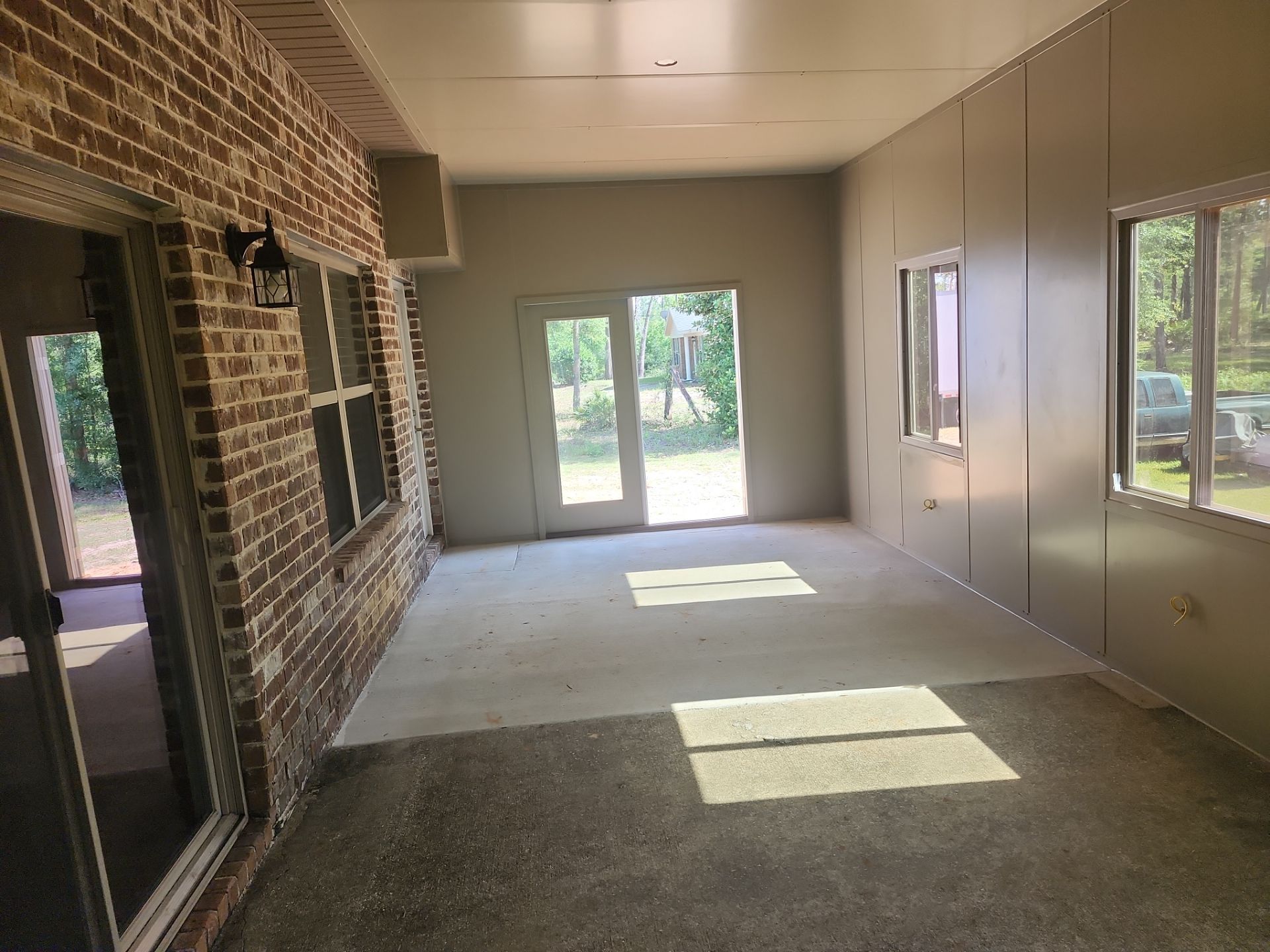 Patio to Glass Room Conversion by Titan Sunrooms