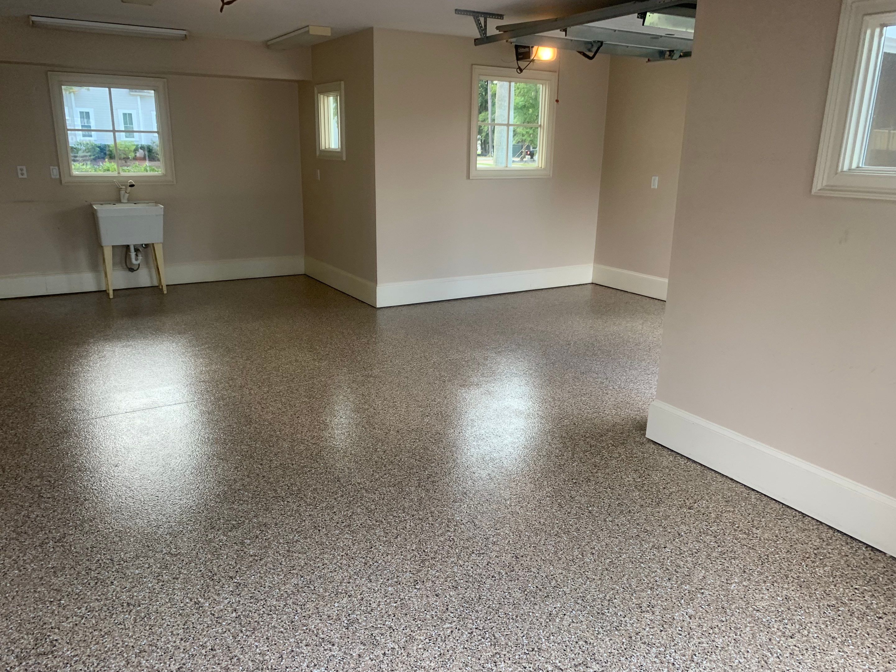 Garage TransFLOORmation using Sandstone by Innovative Concrete Coatings 
