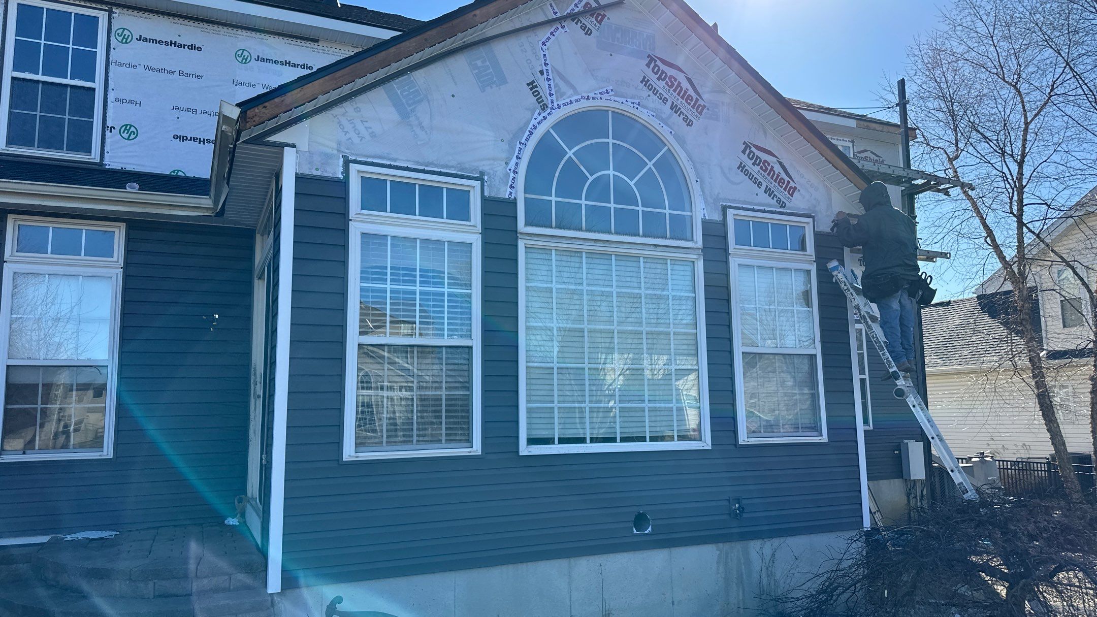 Roofing & Siding  by Tamlin Roofing