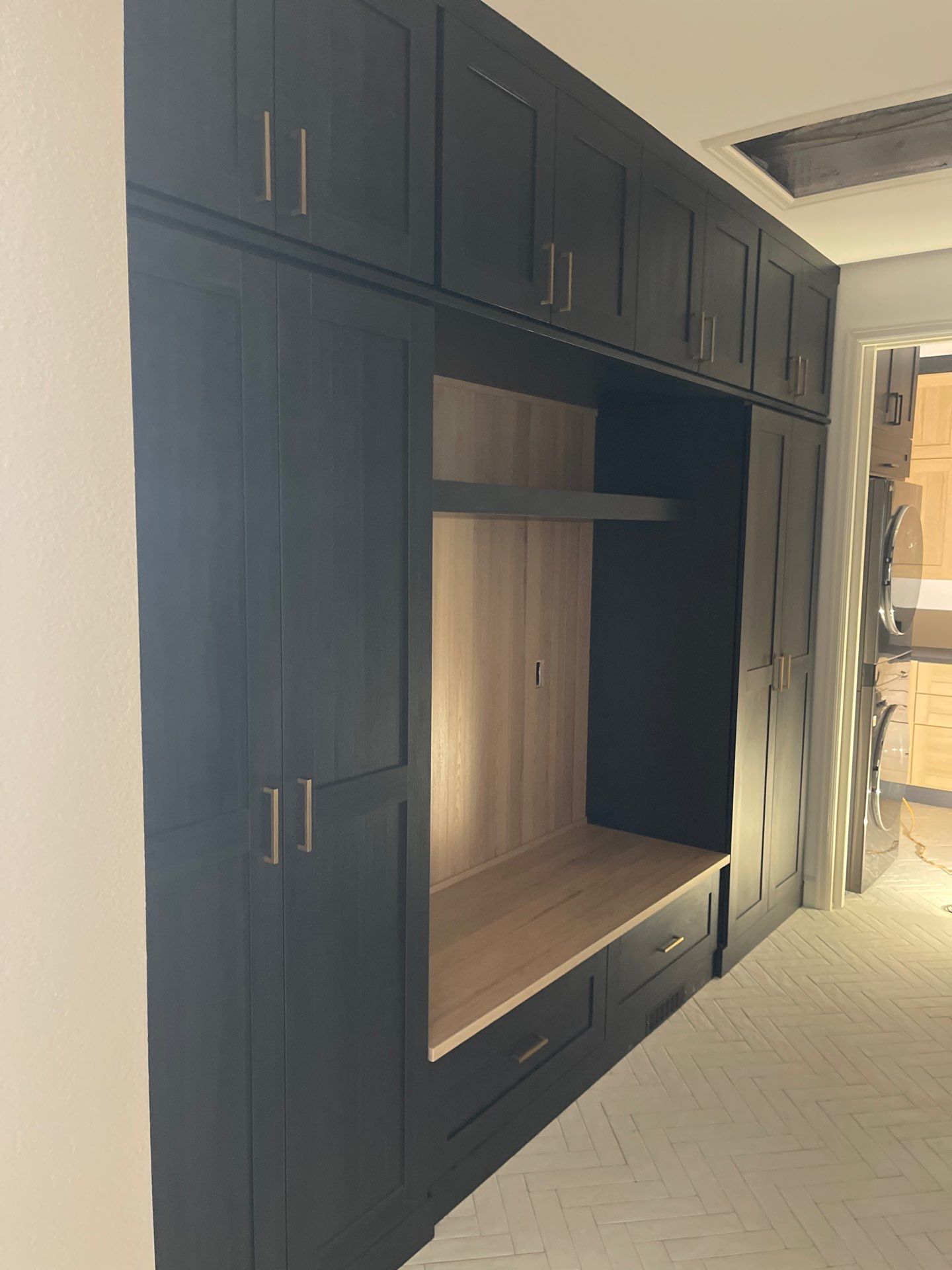 Two-Tone Closet with matching Mudroom + Laundry Room by Concept 32, Inc.