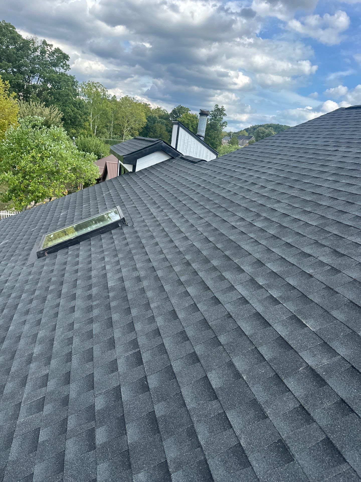 Residential Roofing Installation using GAF Timberline HDZ Charcoal by Rainstoppers Roofing