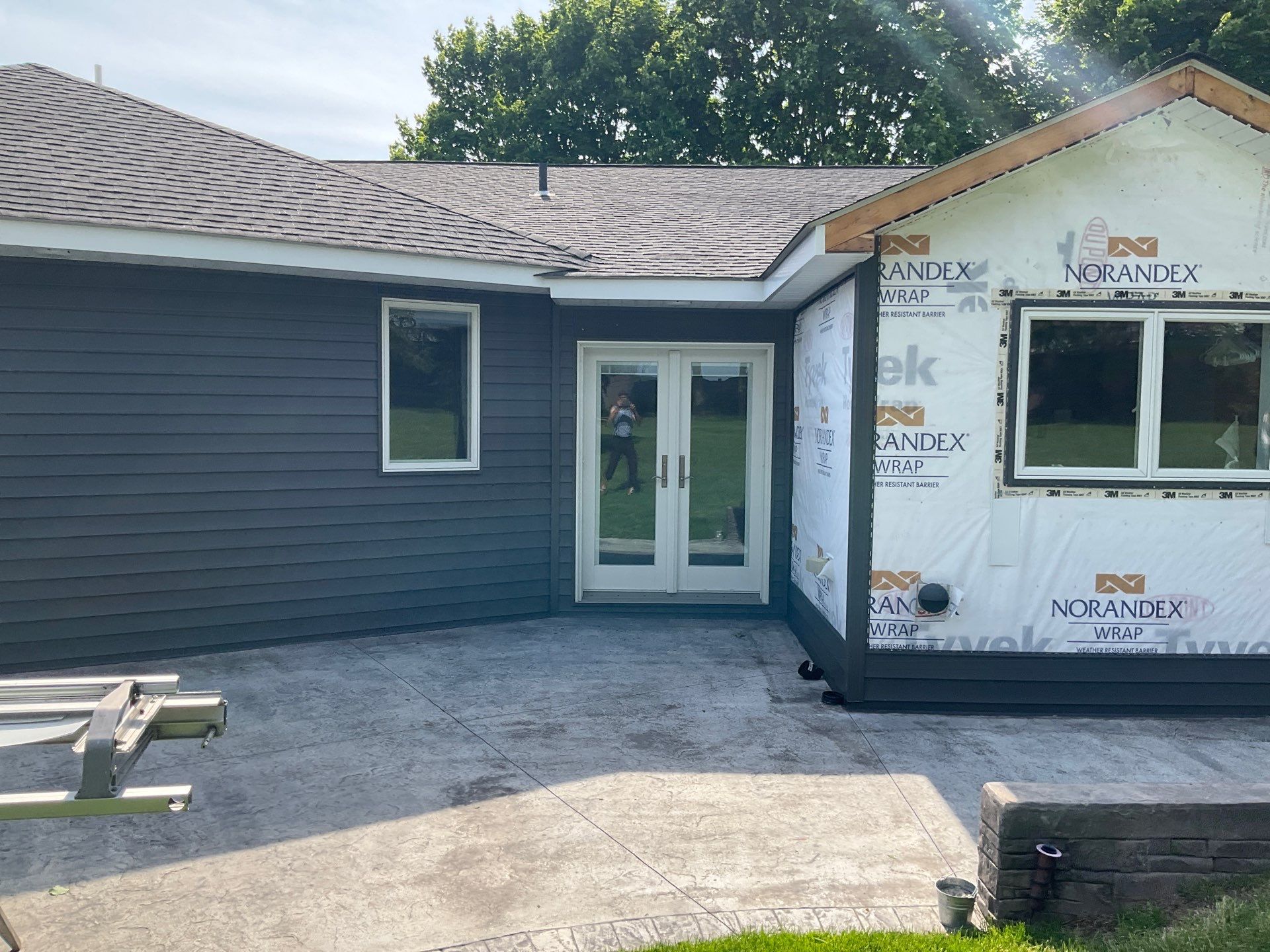 Nightfall Exterior Siding Replacement and Stone Veneer in Halifax by Esh Builders