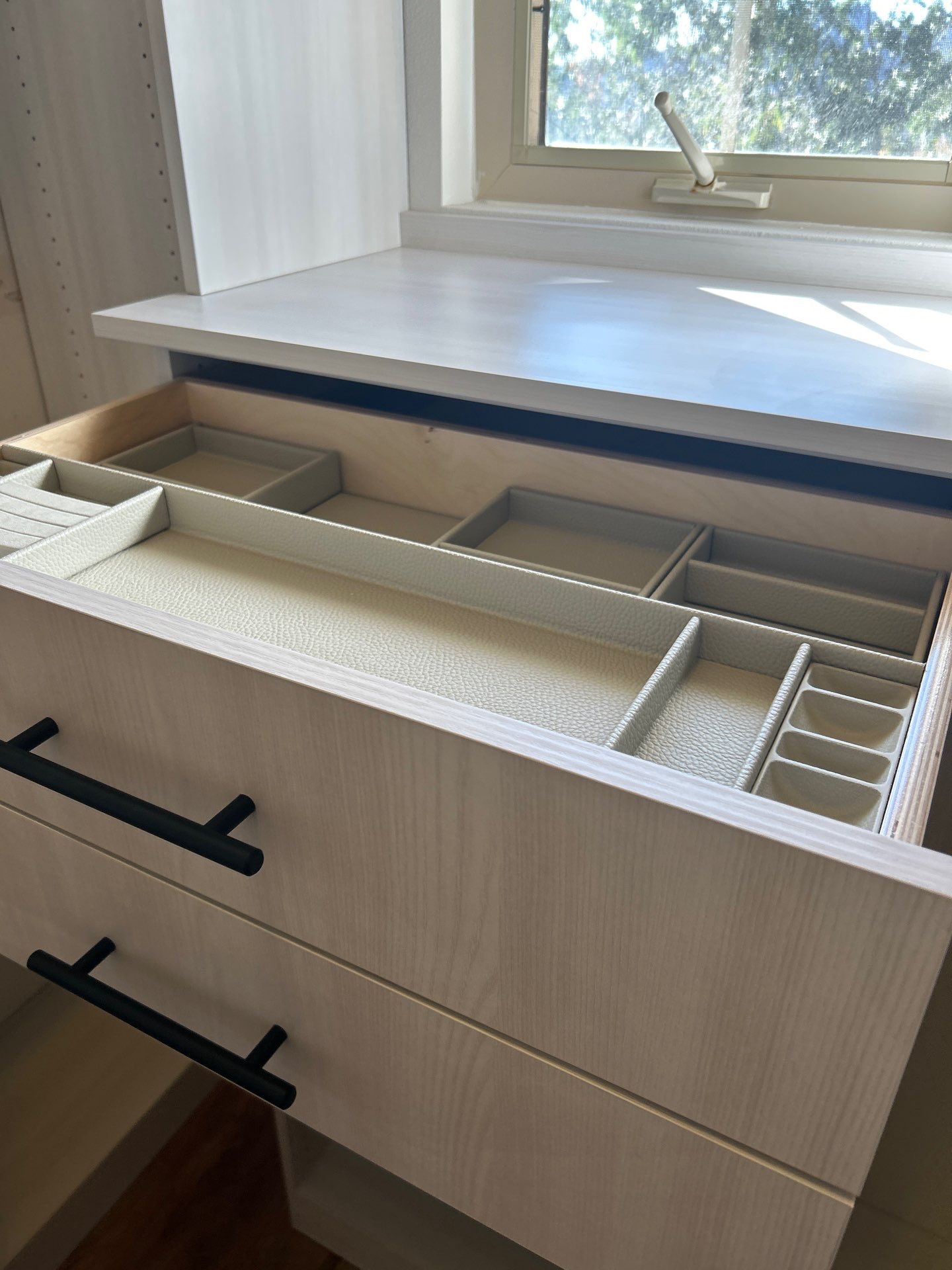 Walk-in Closet in a Small Space by Concept 32, Inc.