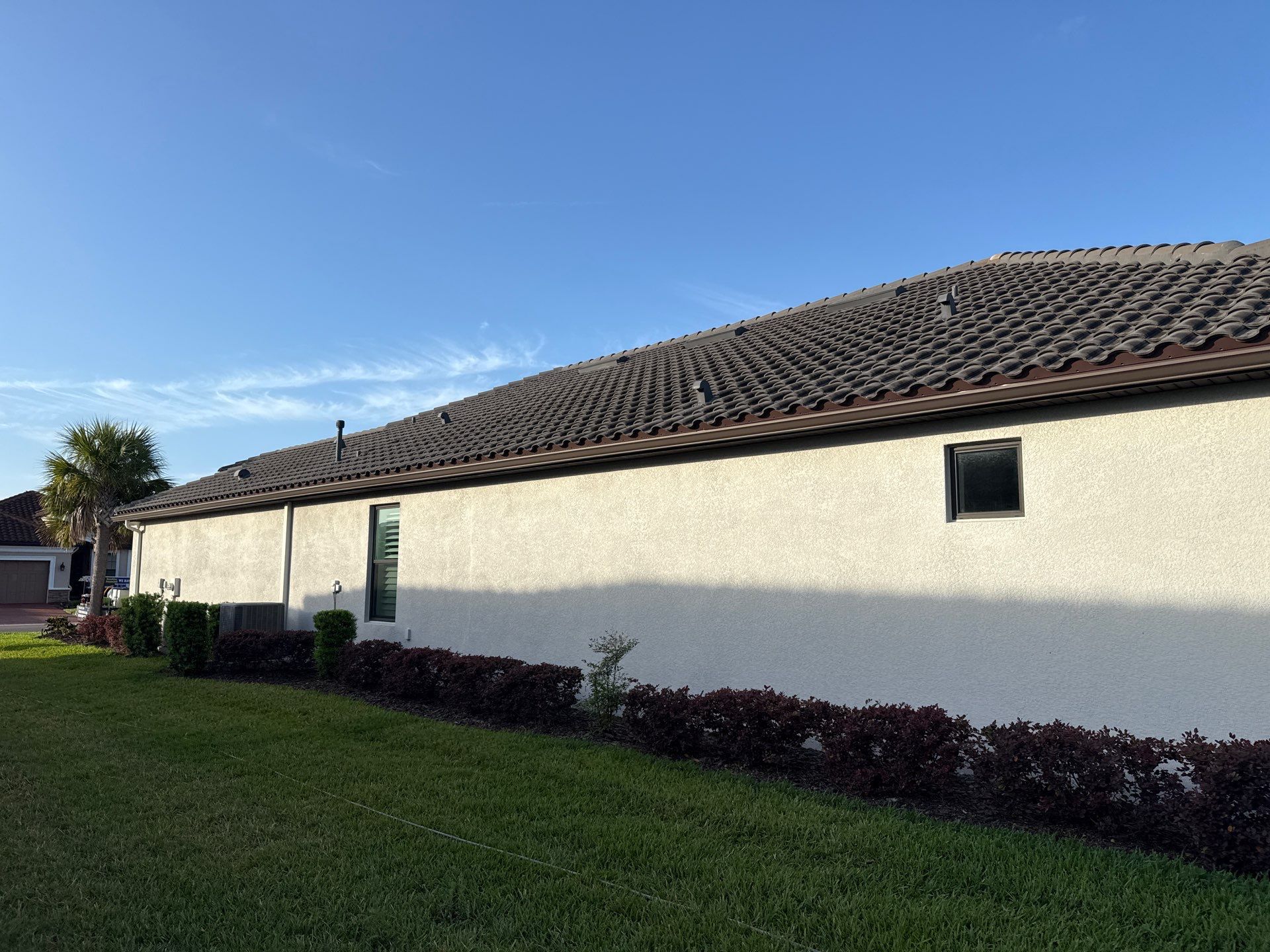 Barrel Tile Roof Cleaning in Artisan Lakes, Palmetto, FL | No Roof Walking on Roof by Sunshine AquaWash