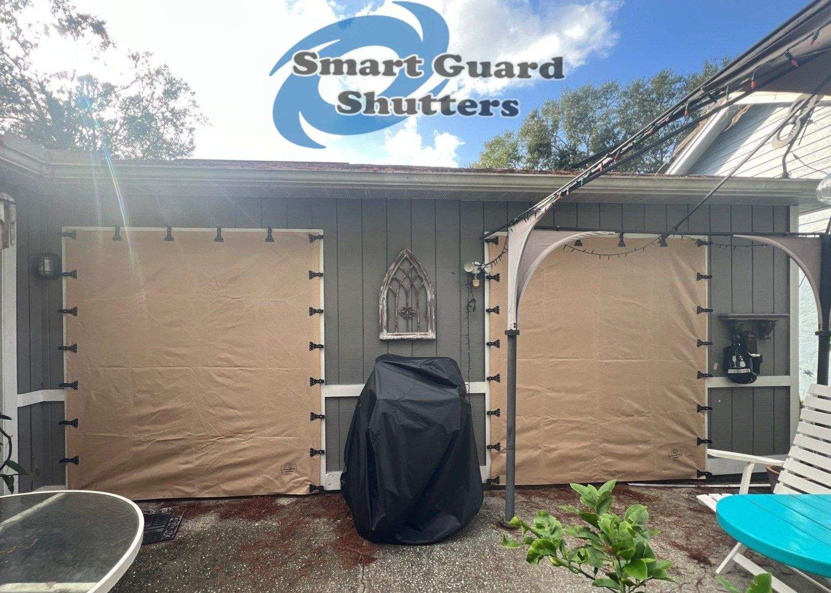 AstroGuard Hurricane Fabric in Tan & Impact Bahamas in Water Blue by Smart Guard Shutters