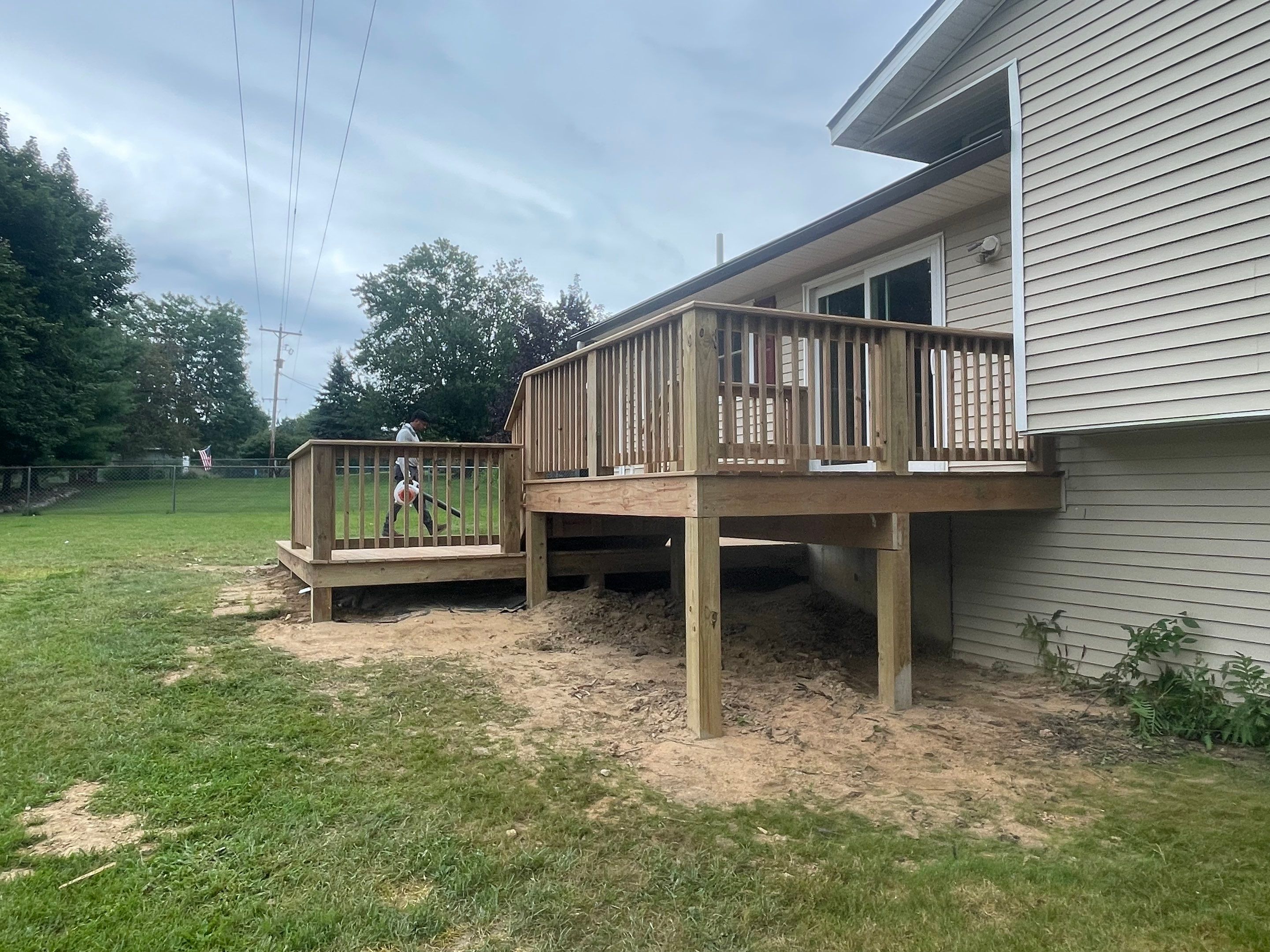 Deck Installation using Treated Lumber by Avalon Roofing and Exteriors
