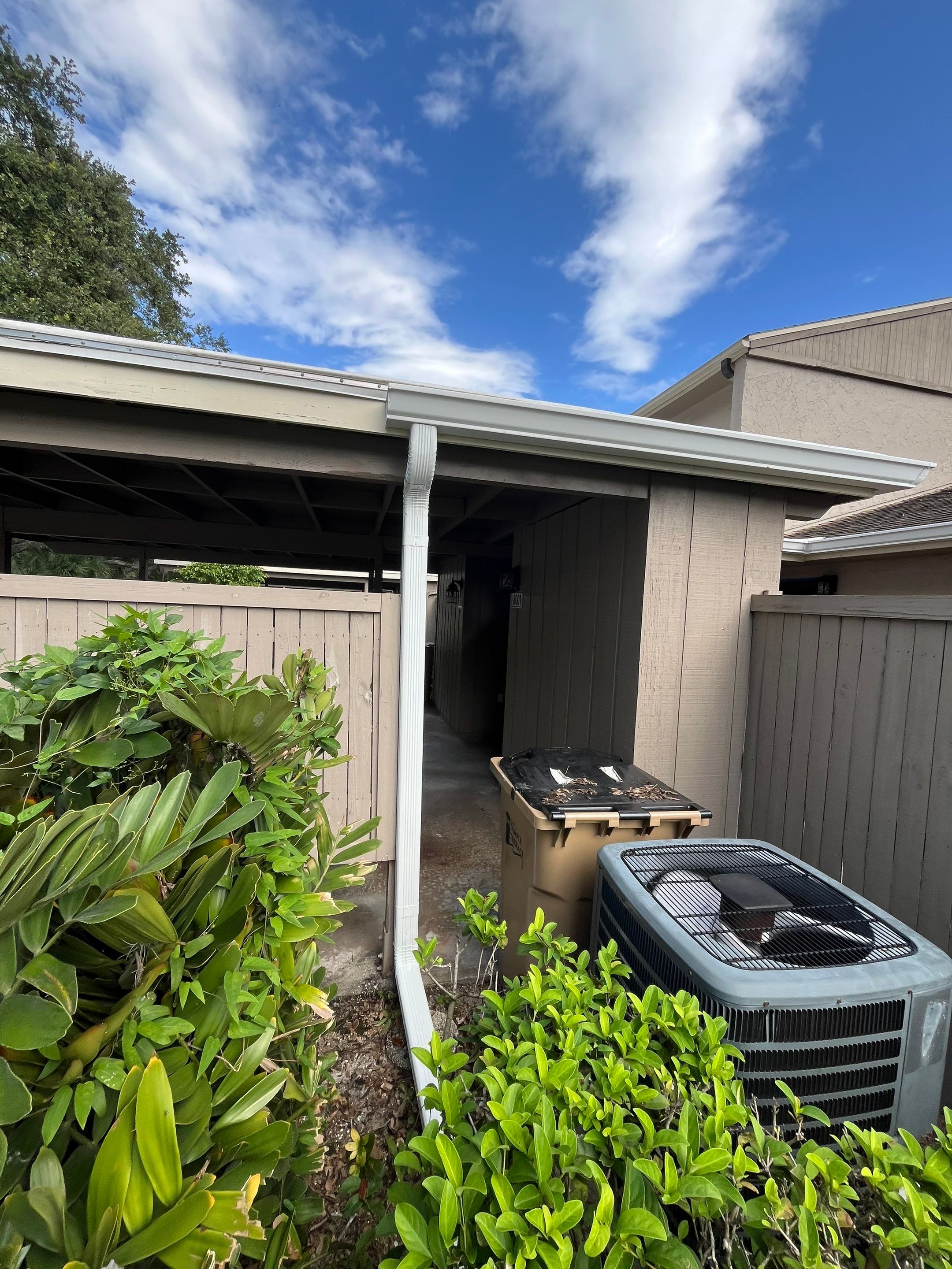 Professional Downspout Installation in Tampa, FL by Gutter Professor by Gutter Professors