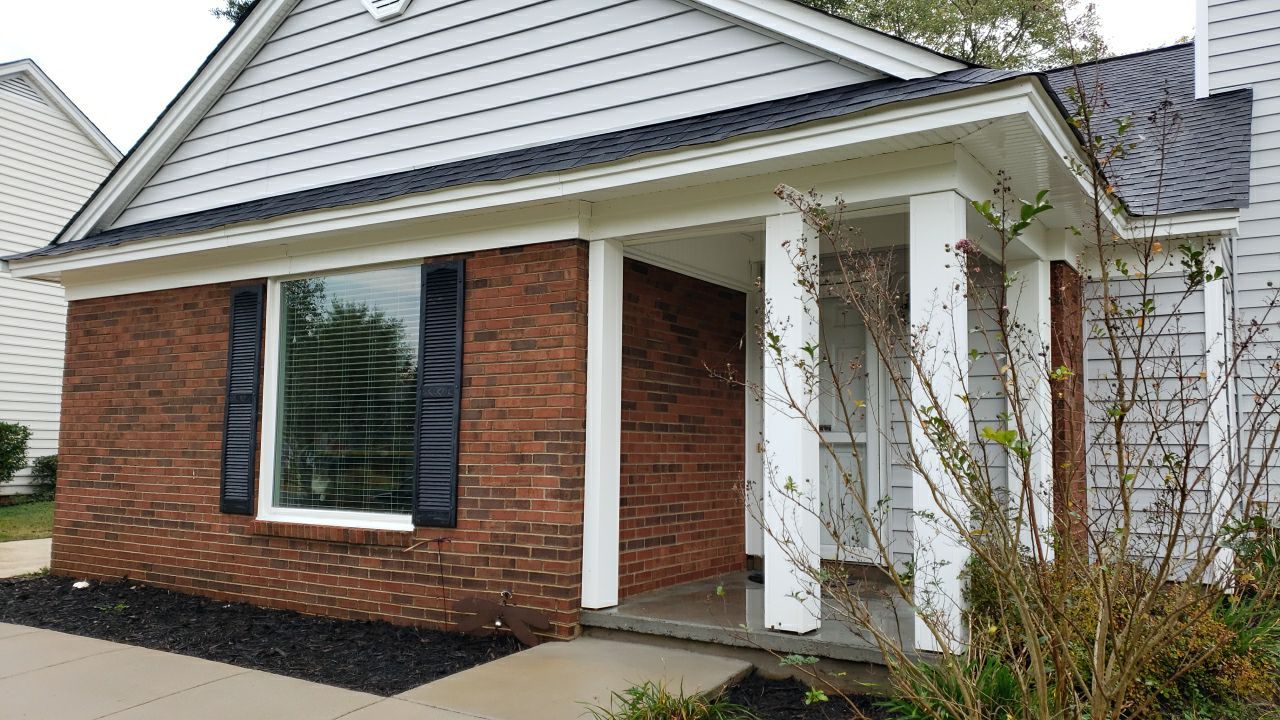 House Wash using cleaner  by Power Wash Masters LLC