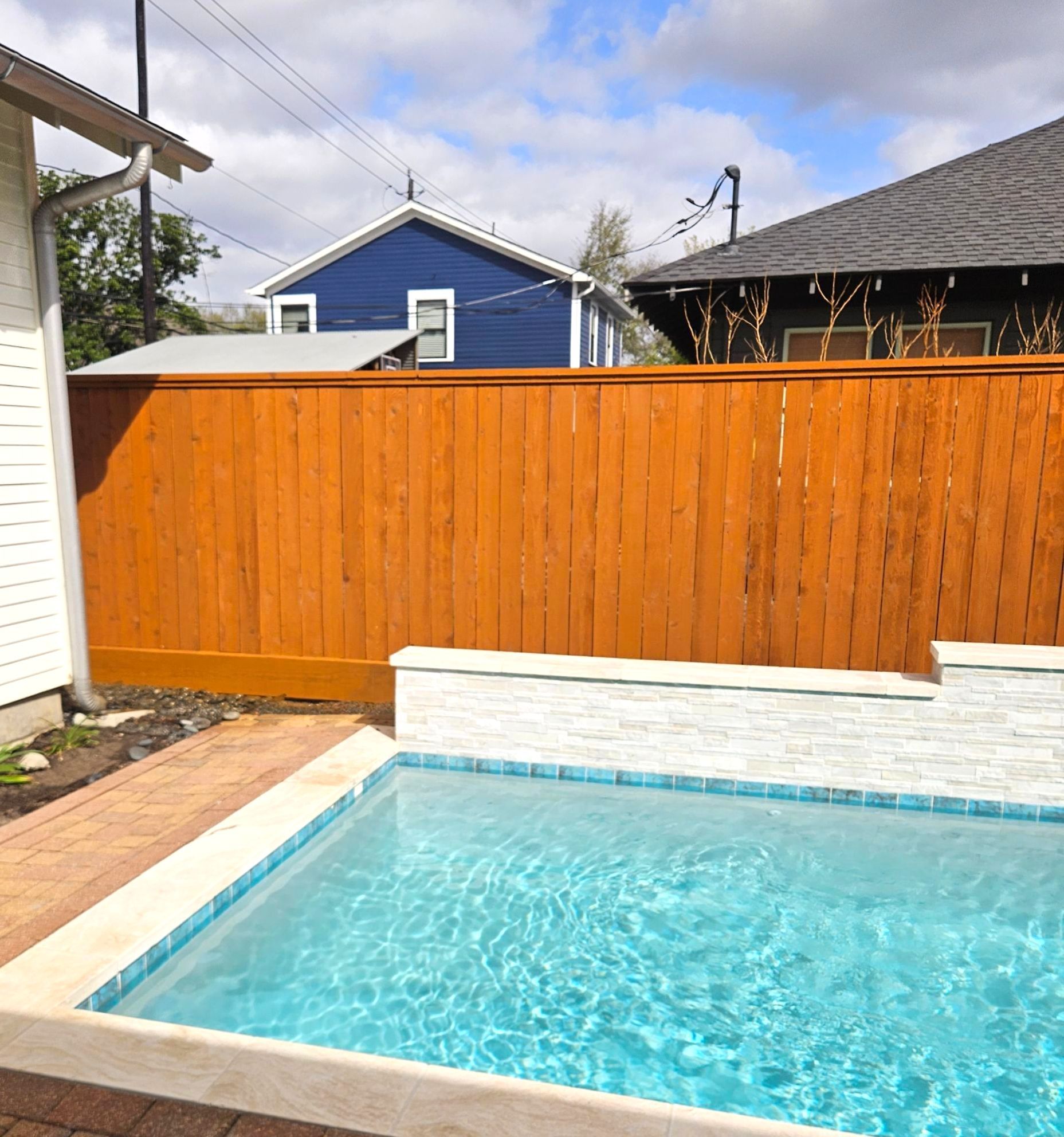 Durable Fence & Gate Installation with Premium Stain by Tim's Fences