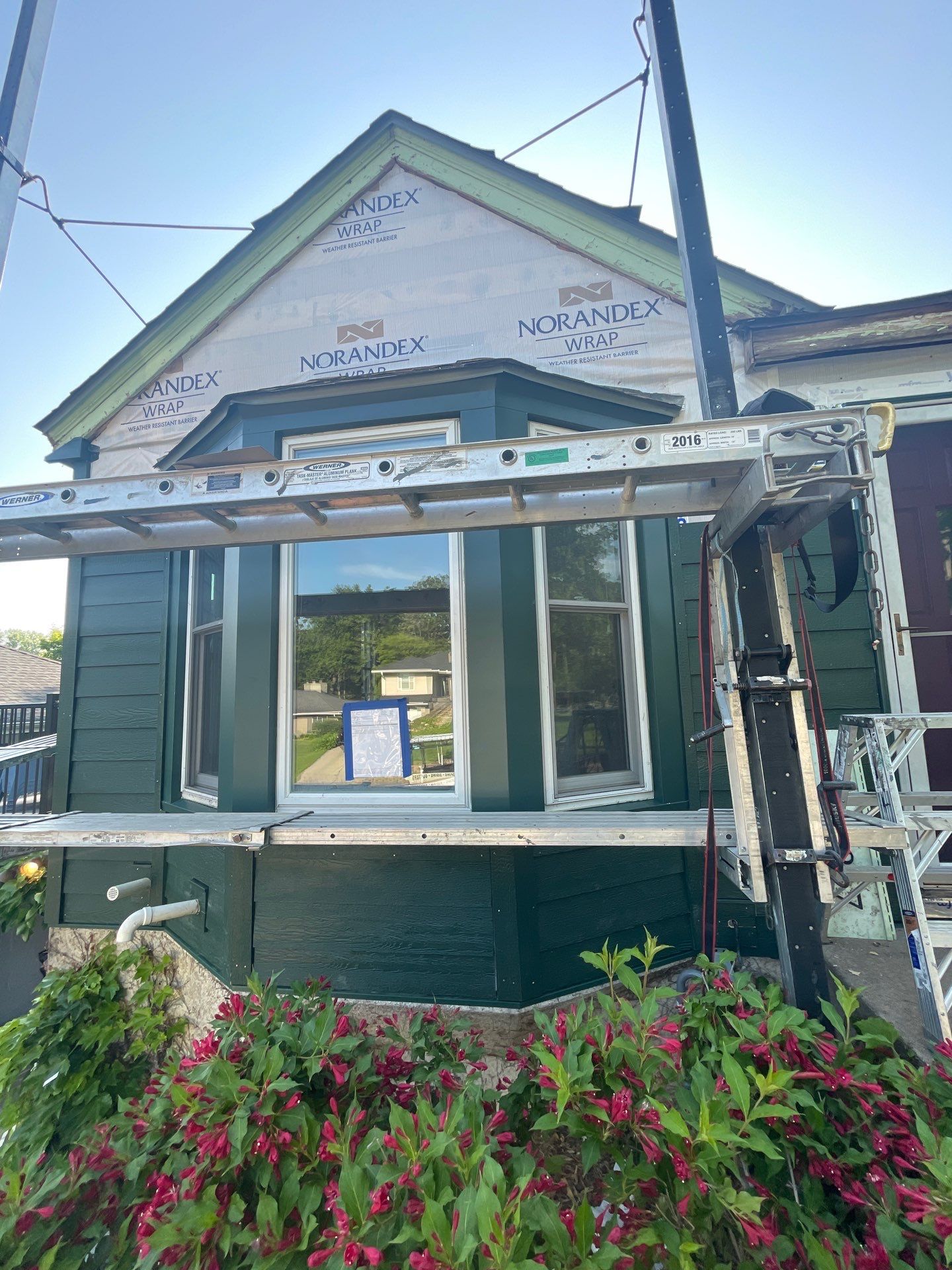 St. Louis Park Roof & Siding Replacement – LP Smartside, Mule-Hide Modified Bitumen, Edco Soffit & Fascia by First Impressions Exteriors
