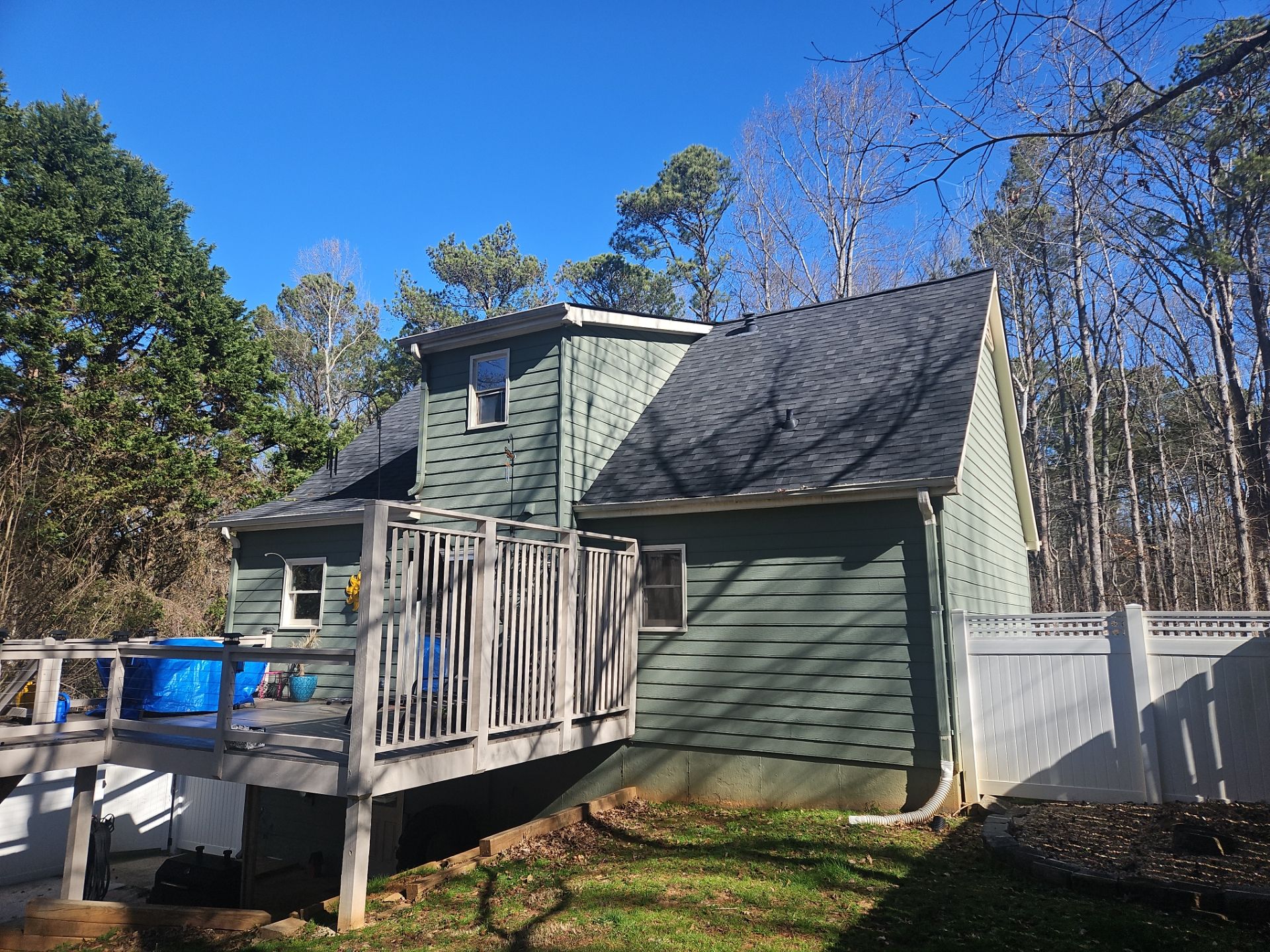 James Hardie Siding Install, Rotten Wood and Gutter Replacement and Exterior Painting by Nelson Exteriors 