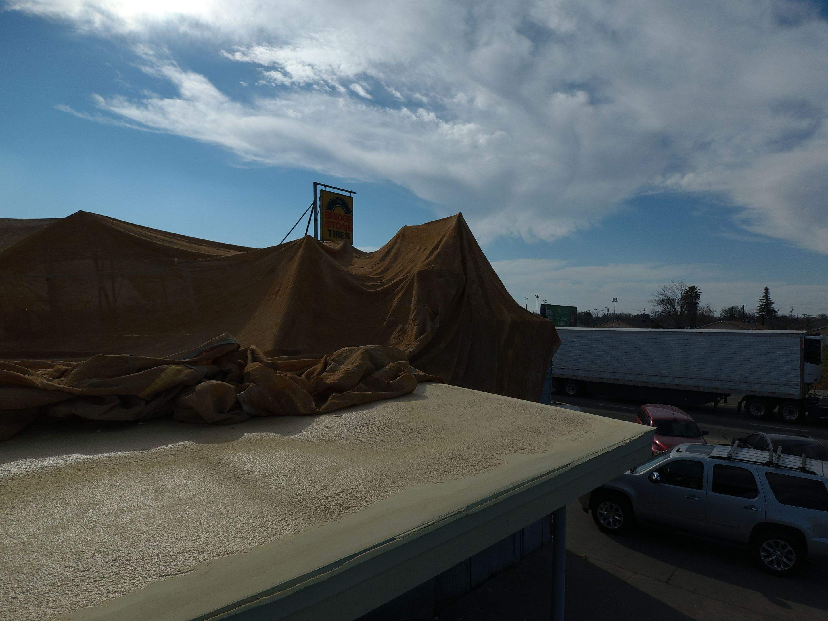 Spray foam and coatings using Conklin Benchmark/PUMA XL coatings and spray foam by Straight Edge Roofing Inc