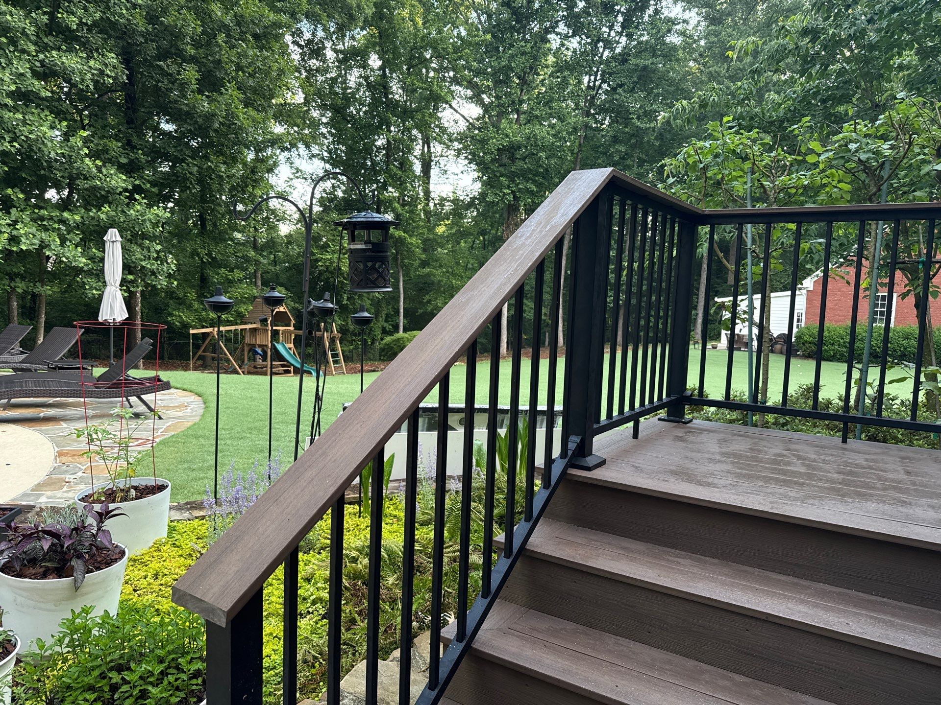 Lawrenceville, GA Deck Resurface using Deckorators Voyage Series with Timbertech LED Riser Lights by Nelson Exteriors