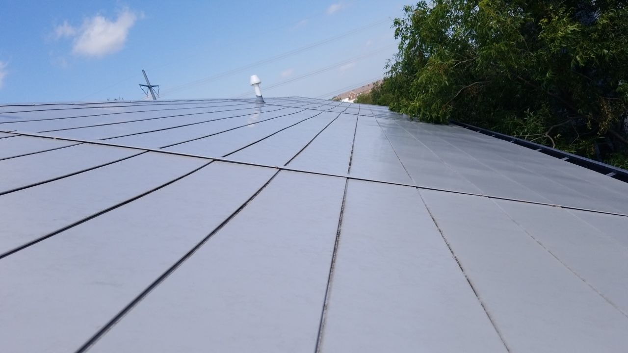 Metal Roofing project using MBCI Flexloc Panels - 22 gauge - silver metallic-in-color by Becker Roofing and Exteriors