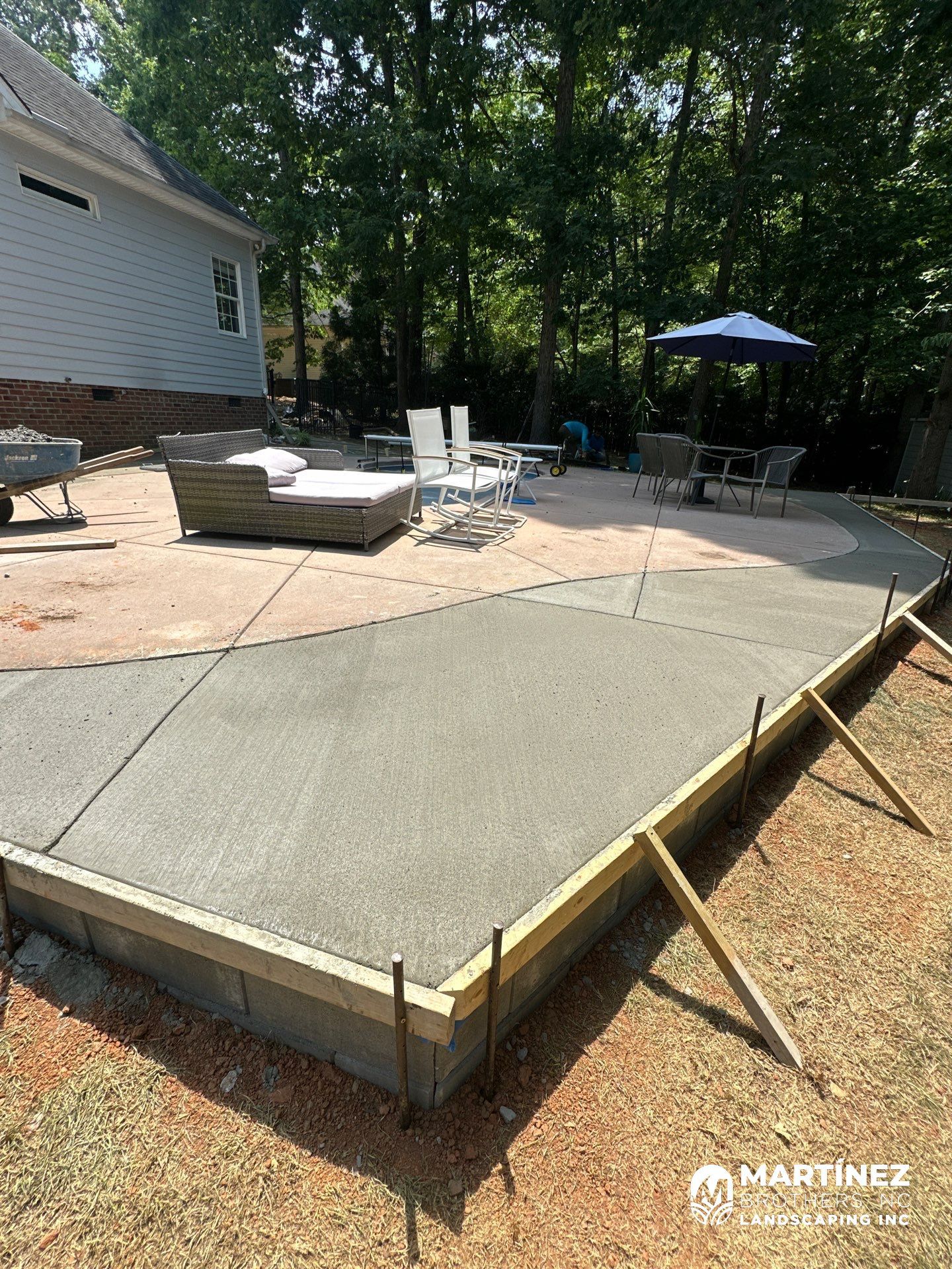 Cool decking pool in Youngsville by Martinez Brother’s Nc Landscaping Inc