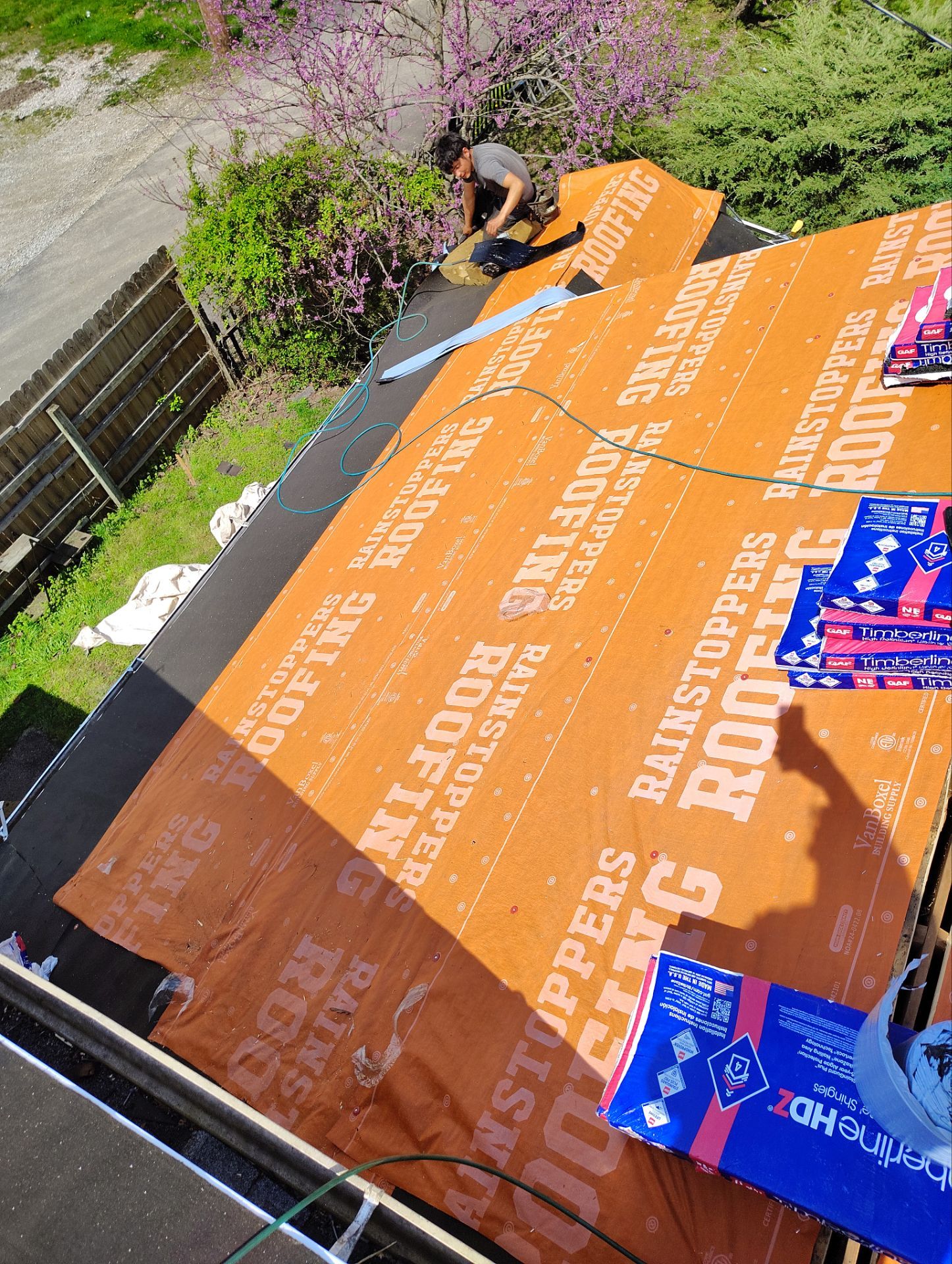 Residential Roofing Installation using GAF Timberline HDZ Charcoal by Rainstoppers Roofing