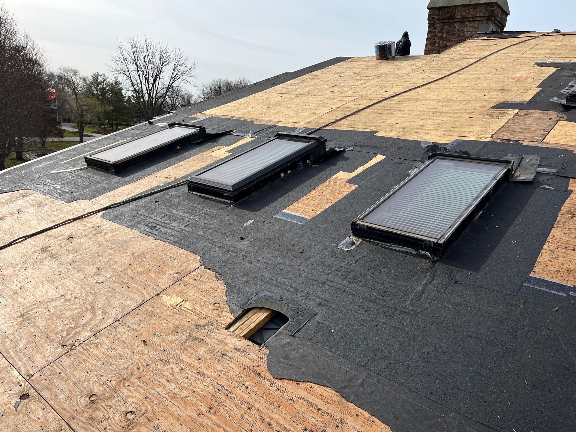 Asphalt Roof Replacement by Custom Installations