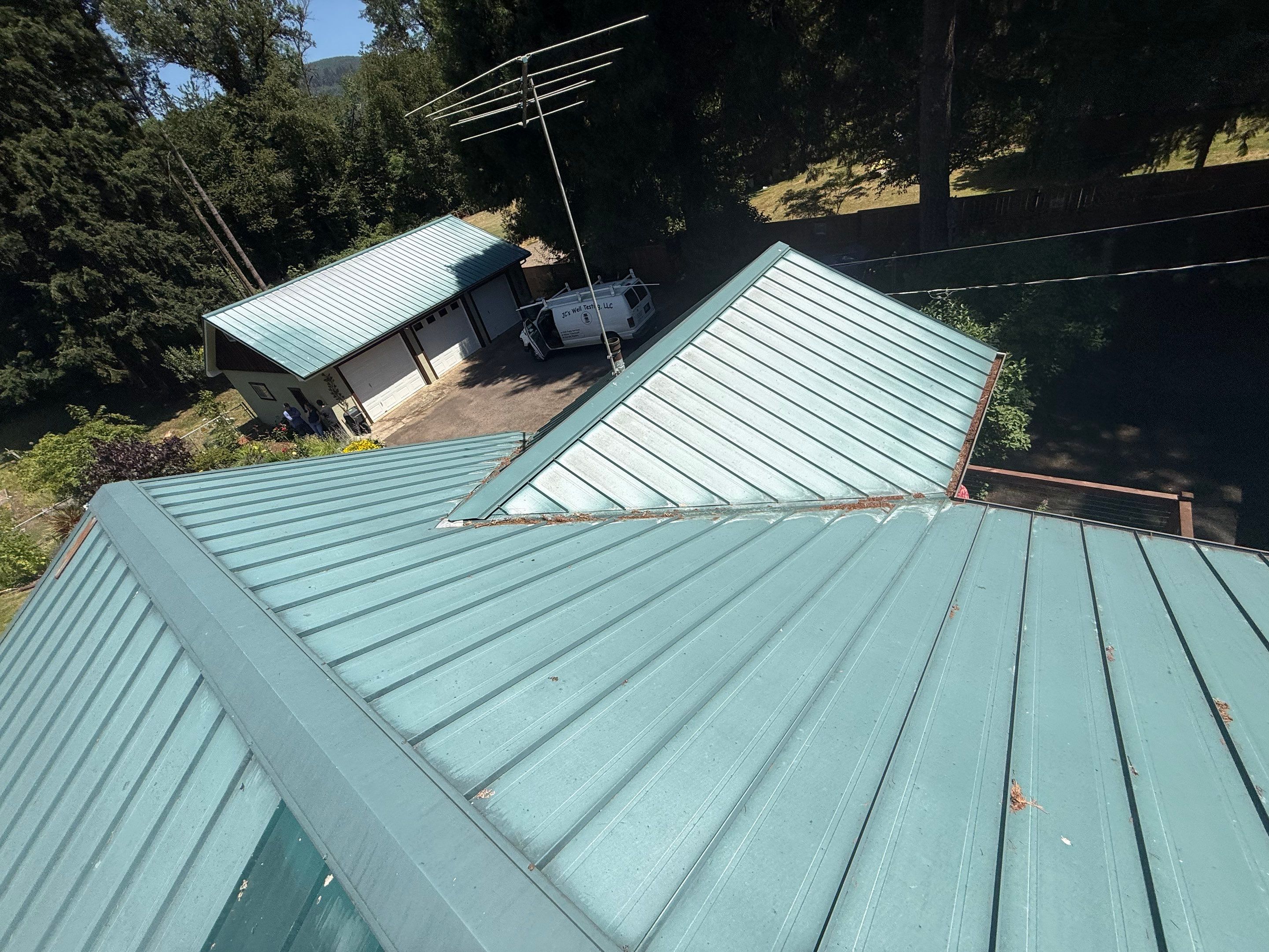 Log Cabin Metal Roof Repair and Skylight Maintenance in Springfield by BEST Roofing & Waterproofing