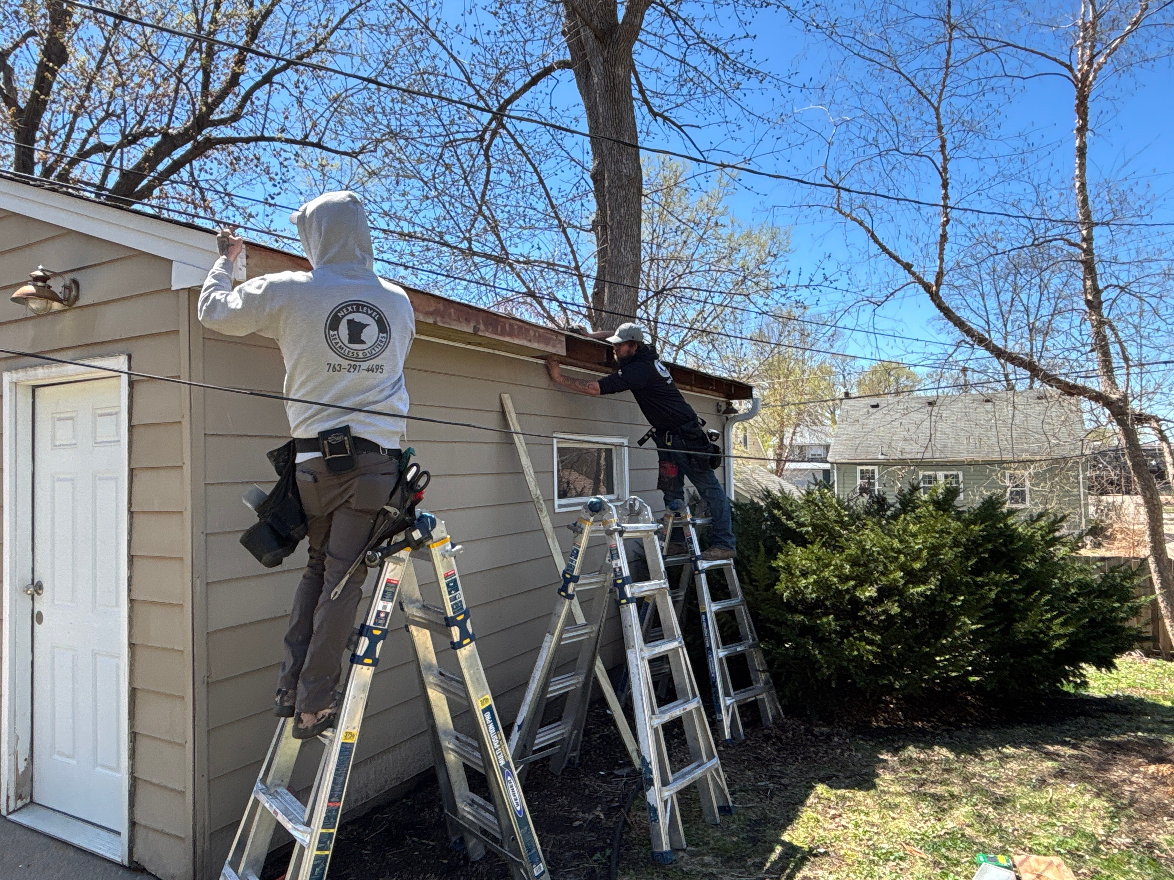 Soffit Repair + 5" Gutter Installation on Garage by Next Level Seamless Gutters / Exteriors Inc.