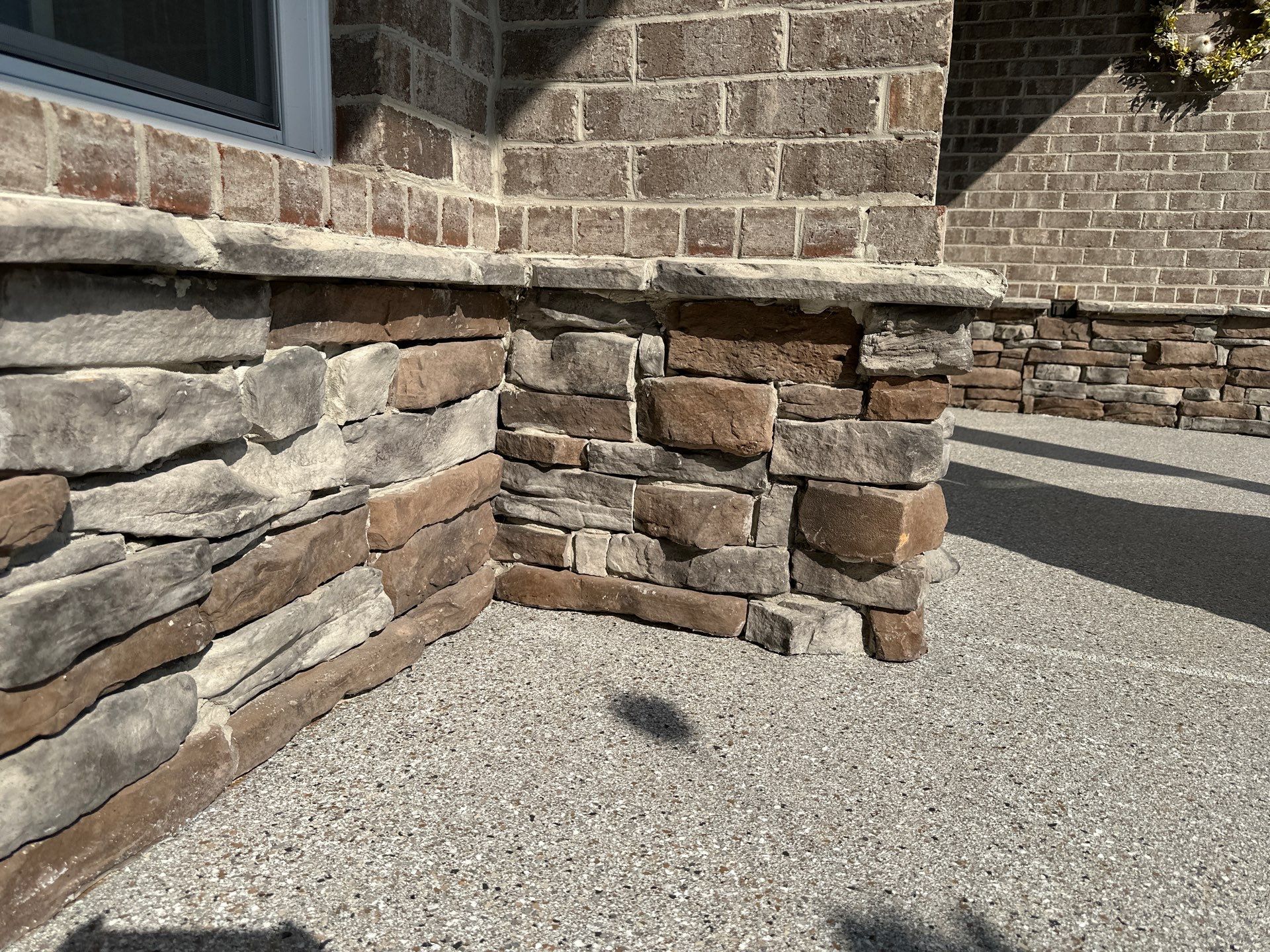 Driveway Improvement Using Claystone With Trail Mix Border! by Elite Floor Solutions