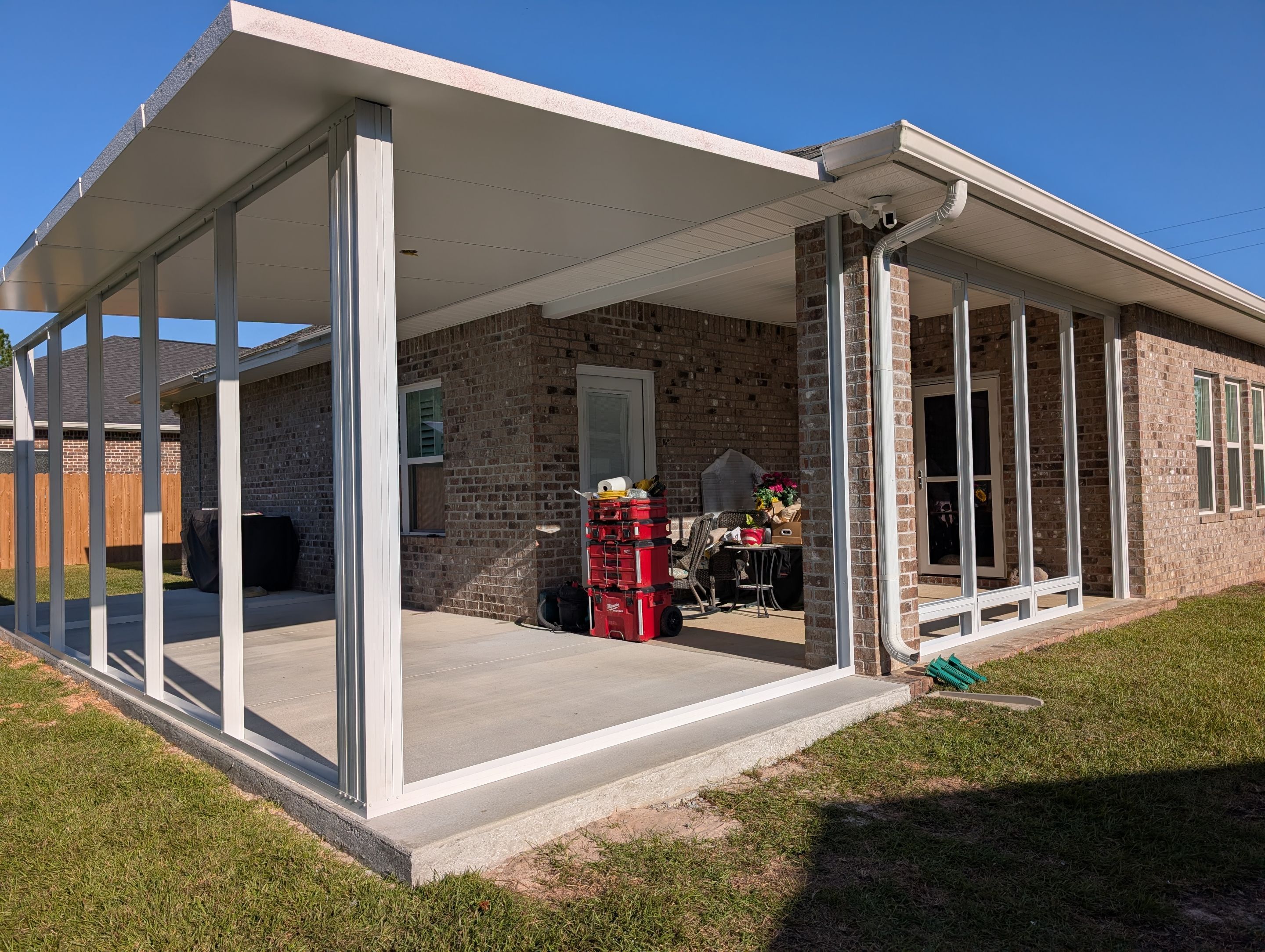 Home addition w/Vinyl 4-Track Windows by Titan Sunrooms