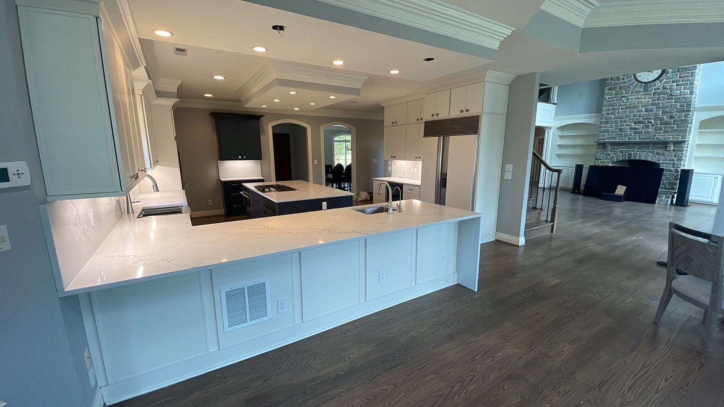 Kitchen Remodel using Fabuwood Luna Dove and Indigo Cabinetry by HomeWerkes Design & Build