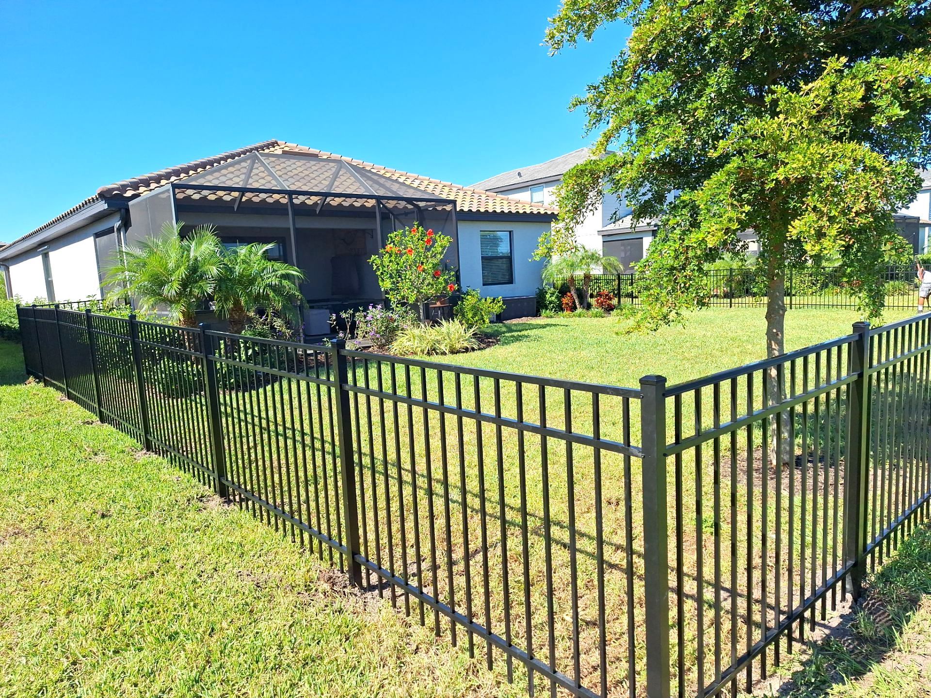 Aluminum Fence Installation using 4ft 3 Rail Black Aluminum Fence by Asap fence and gates, LLC