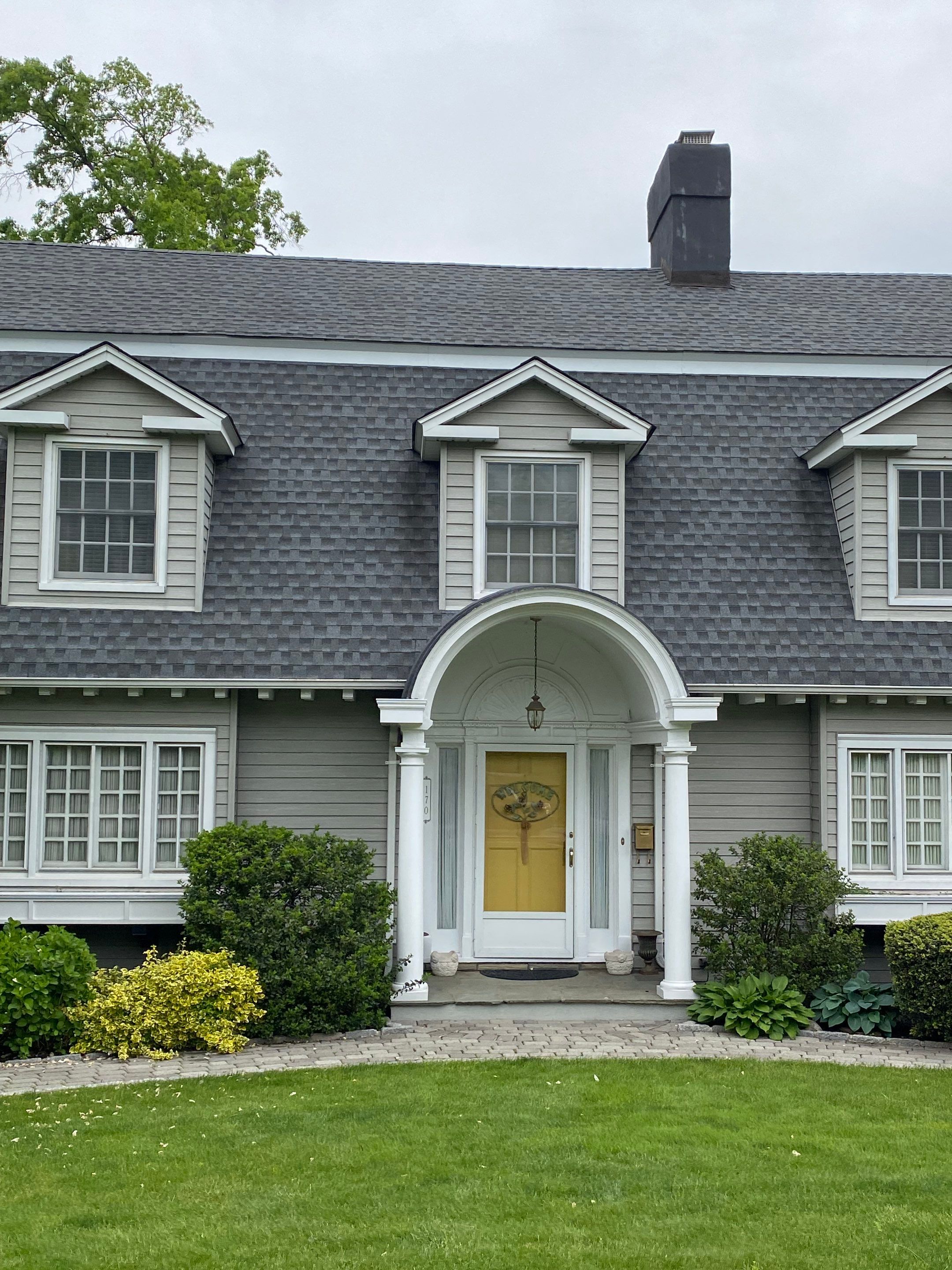 Estate Gray Shingles by Reimagine Roofing