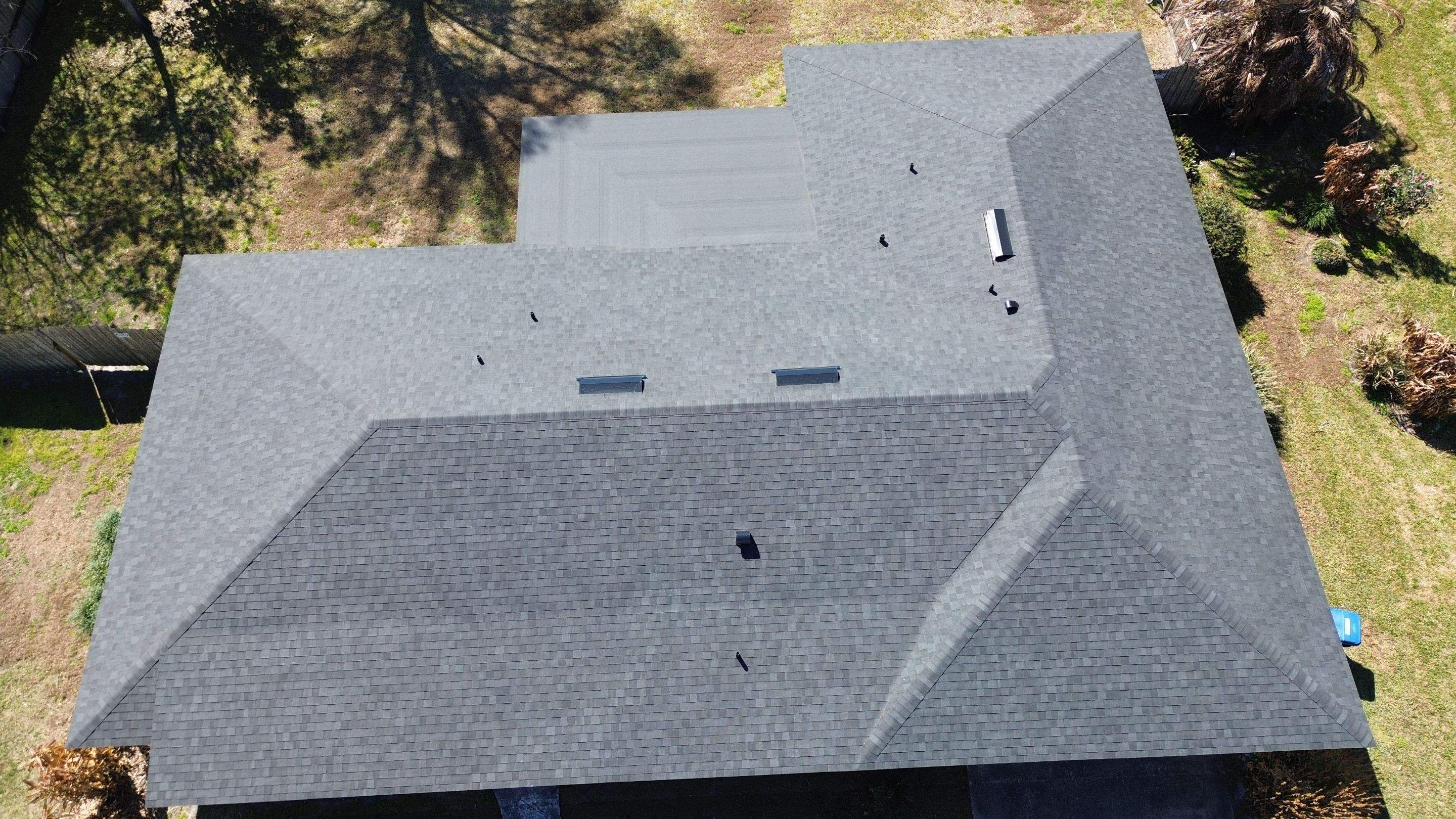 Moire black roof in Conway FL by Gold Key Roofing