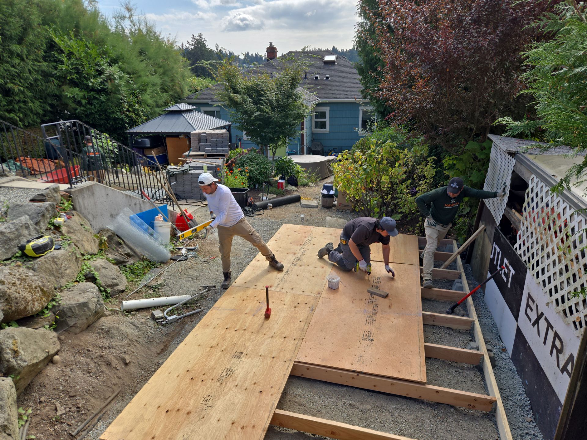 Backyard Transformation — Custom Shed, Paver Patio & Retaining Wall by Habanero Garden and Exterior Care