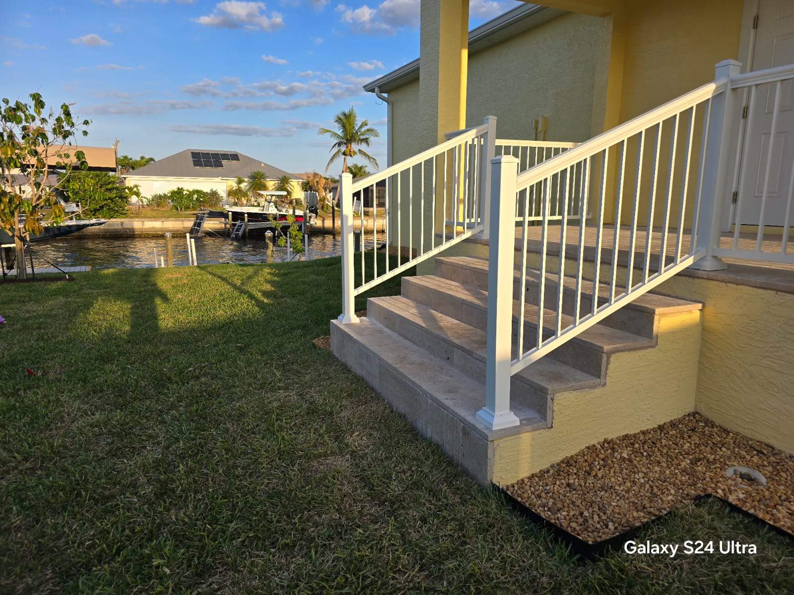 Vinyl Privacy Fence and Porch Railing Installation in Port Charlotte by True Fence LLC