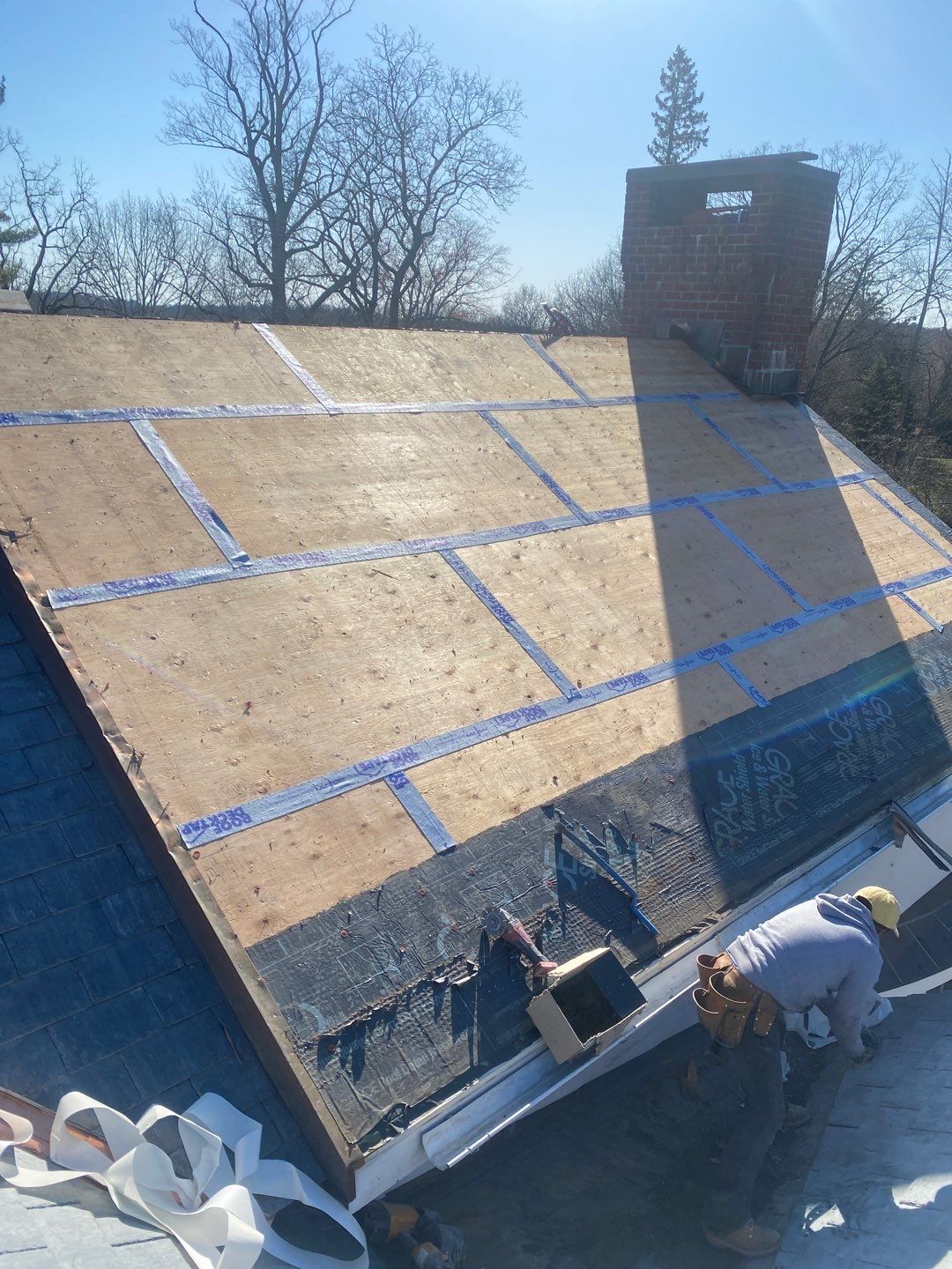 Residential Roofing Installation using Vermont Slate by A Plus Exterior