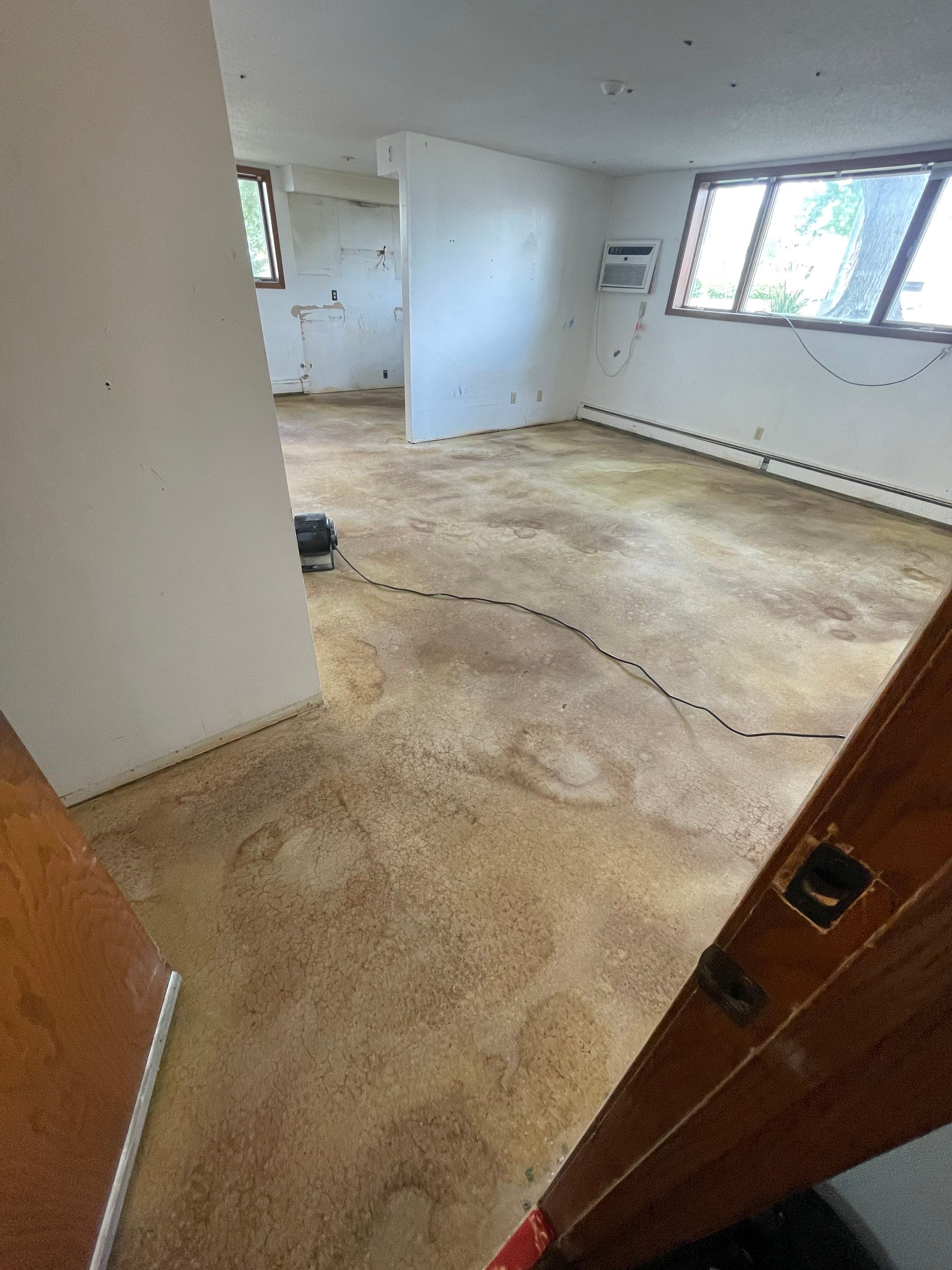 Commercial Subfloor Preparation and Flooring Restoration in Sioux Falls by Select Painting, Coatings & Garage Cabinets